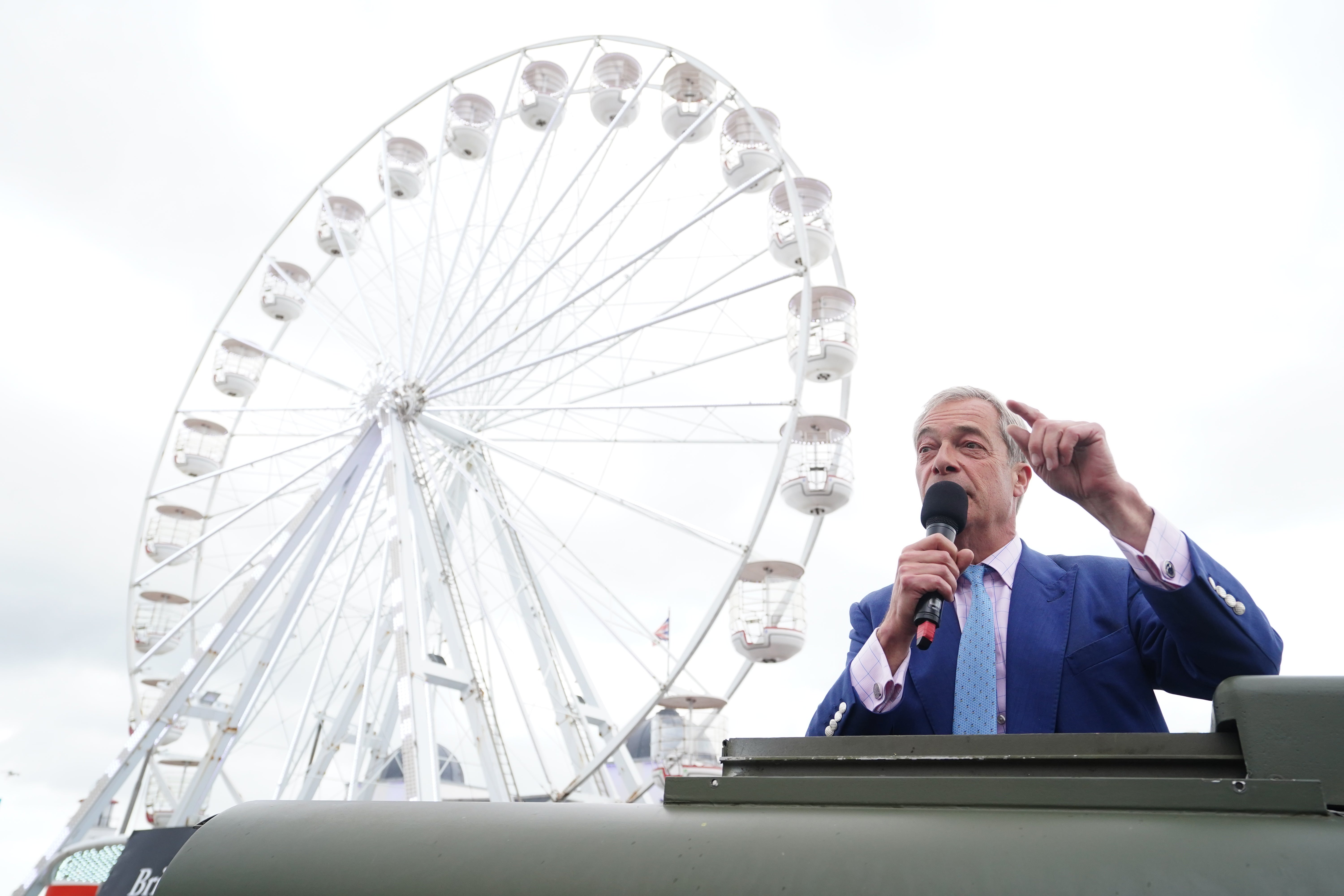Reform UK leader Nigel Farage making a speech at Clacton Pier in Clacton (Ian West/PA)