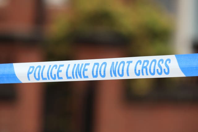 Police tape at a crime scene (Peter Byrne/PA)