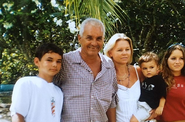 Ryan Cornelius on holiday with his family in 2005. His youngest son Josh, held in the picture by Ryan’s wife Heather, is now 22 years old