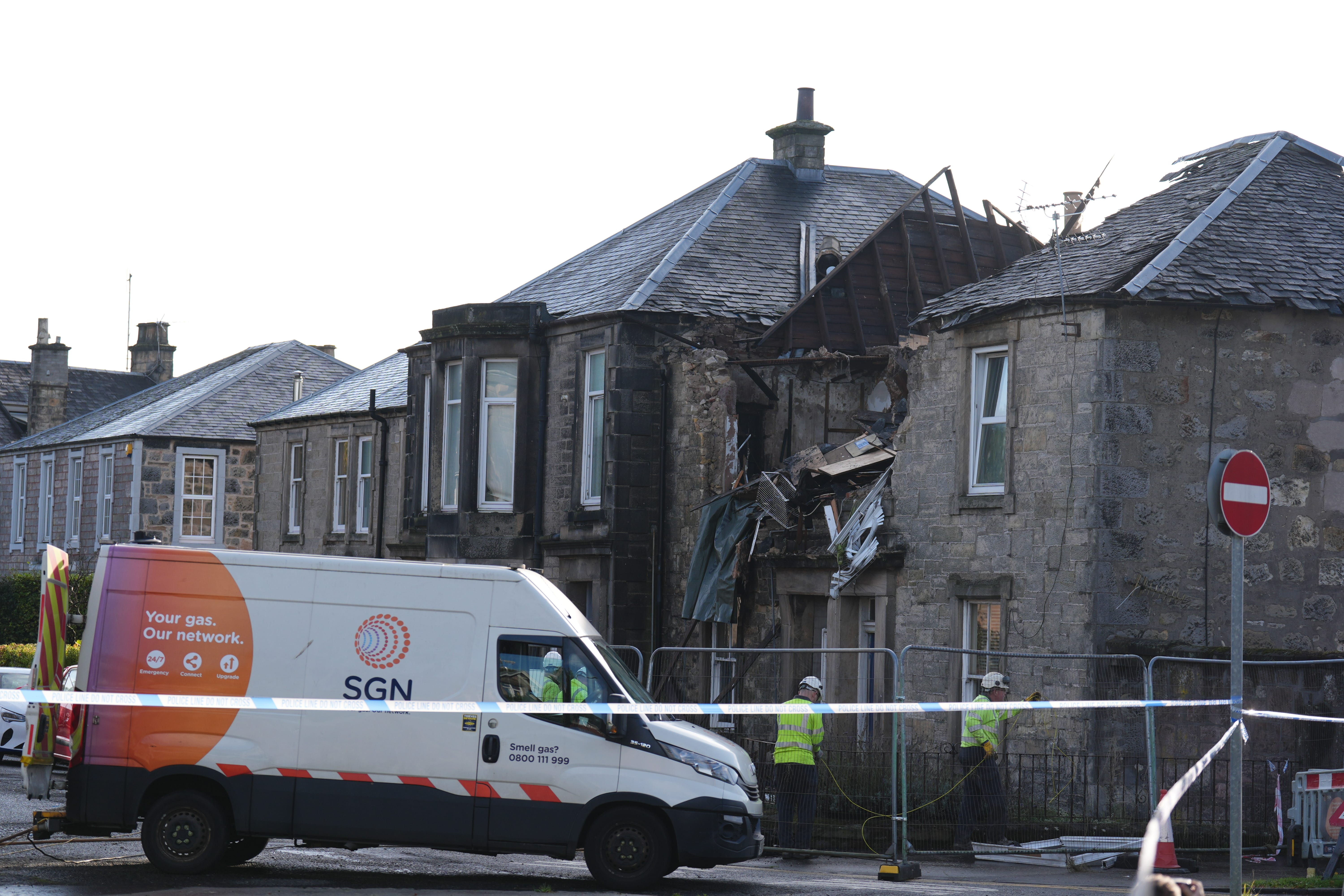 The scene at Kellie Place in Alloa after an explosion ripped through the property on Sunday leaving one man dead and several others injured (Andrew Milligan/PA)