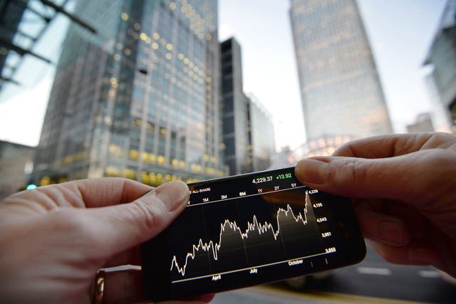 London’s FTSE 100 has moved higher after a mixed day of trading for global markets (John Stillwell/PA)