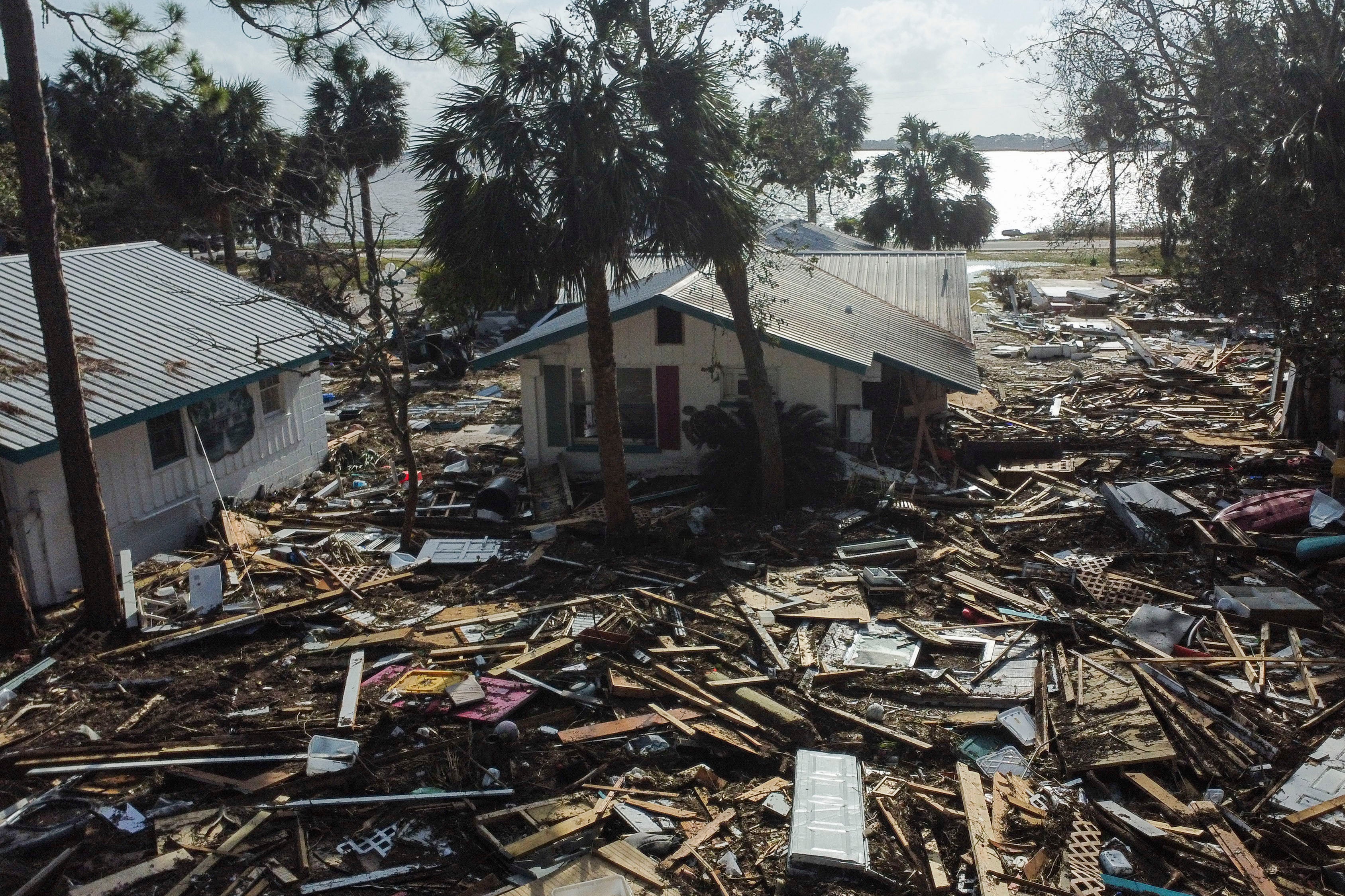 Debris surrounds the Faraway Inn Cottages and Motel in the aftermath of Hurricane Helene, in Cedar