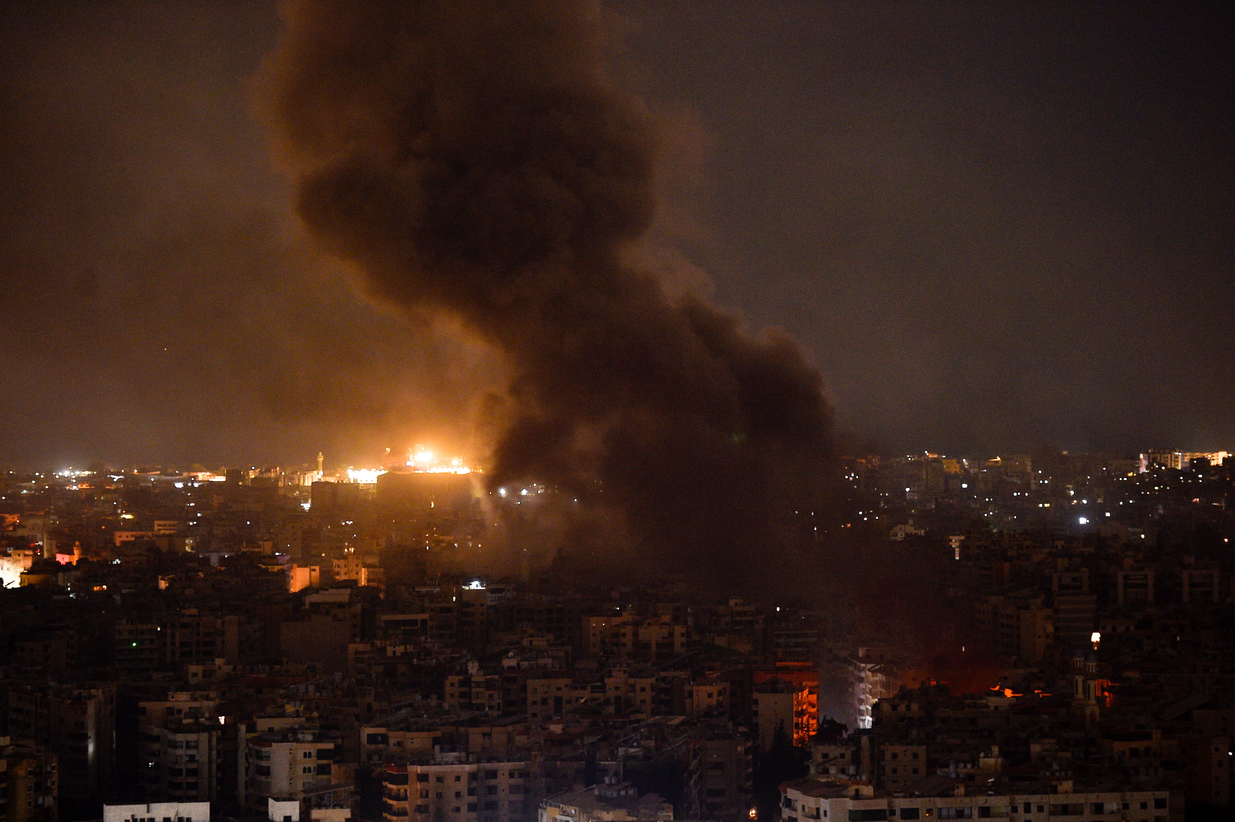 Smoke rises as a result of an Israeli airstrike at Dahieh Hadath area in the southern suburb of Beirut