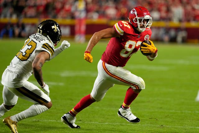 Kansas City Chiefs tight end Travis Kelce runs past New Orleans Saints cornerback Marshon Lattimore (Charlie Riedel/AP)