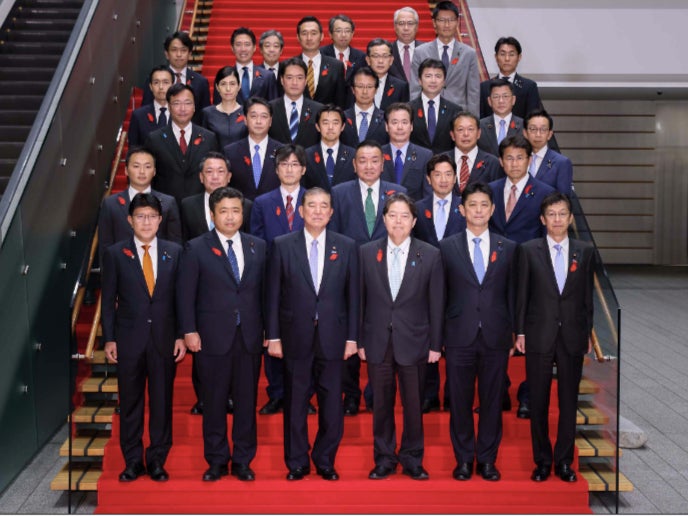 This picture released by Japan’s prime minister’s office shows Shigeru Ishiba (front C) and his cabinet ministers attending a photo session at Ishiba’s residence in Tokyo, Japan on 1 October 2024