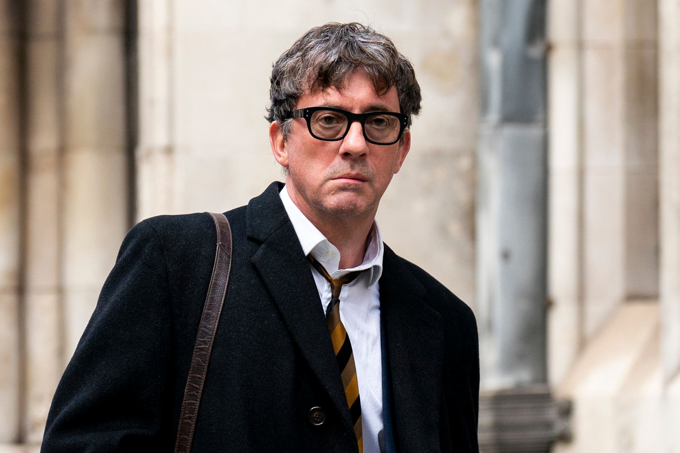 Graham Coxon, guitarist in the band Blur, leaves the Royal Courts of Justice, London (Jordan Pettitt/PA)