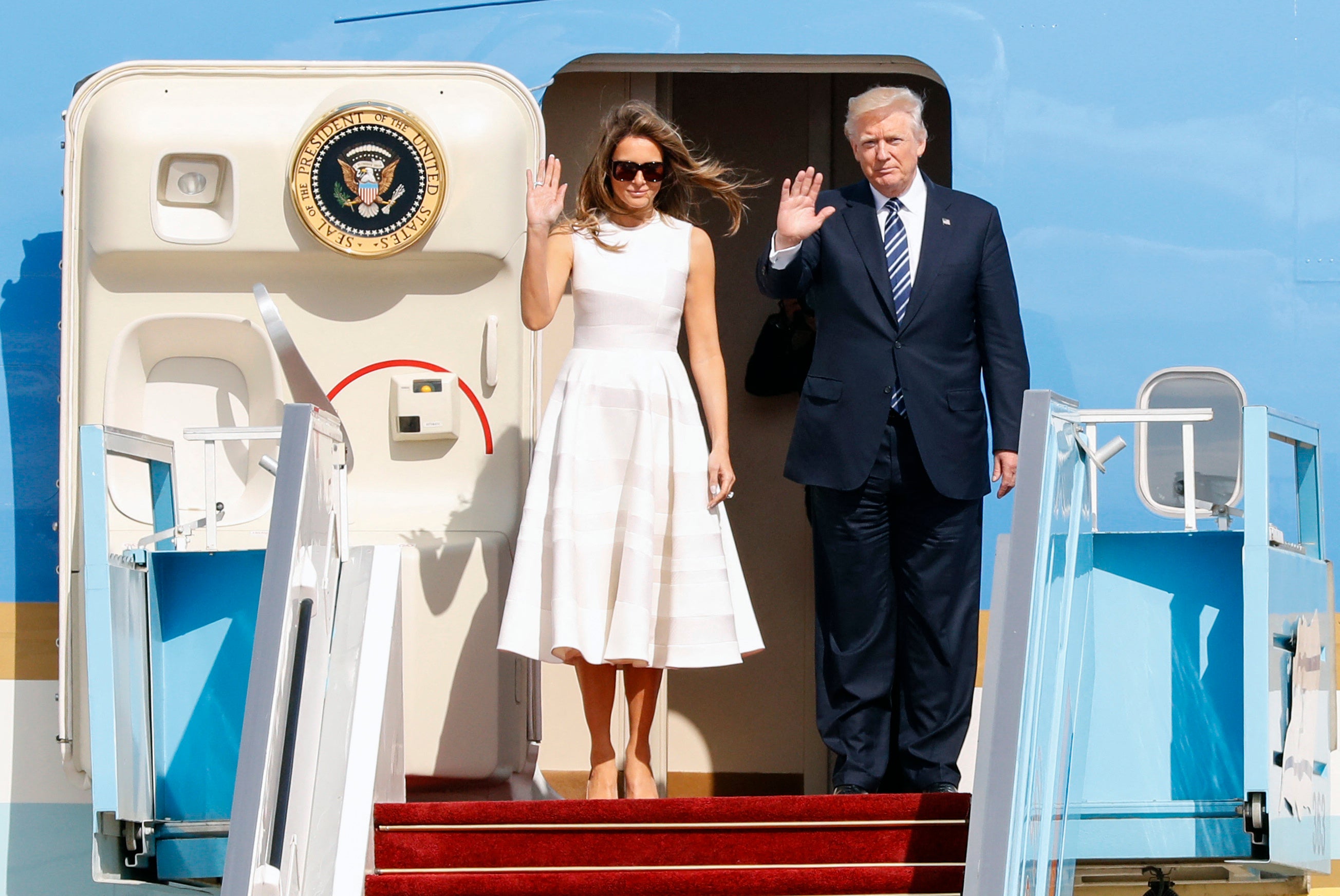 Melania and Donald aboard Air Force One in 2017