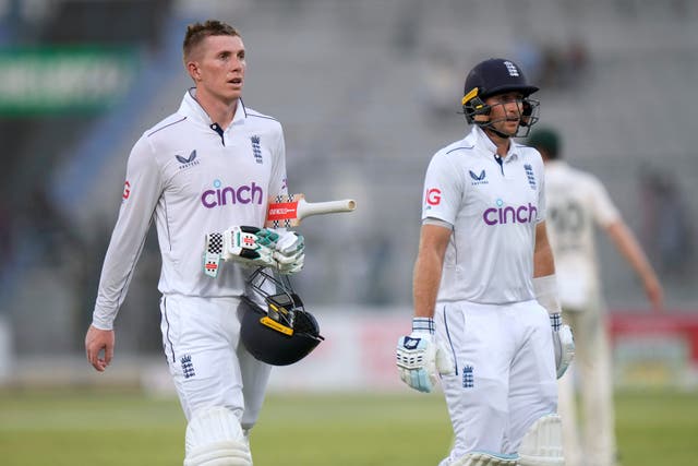 Zak Crawley, left, and Joe Root led England’s fight at the end of a tough day (Anjum Naveed/AP)