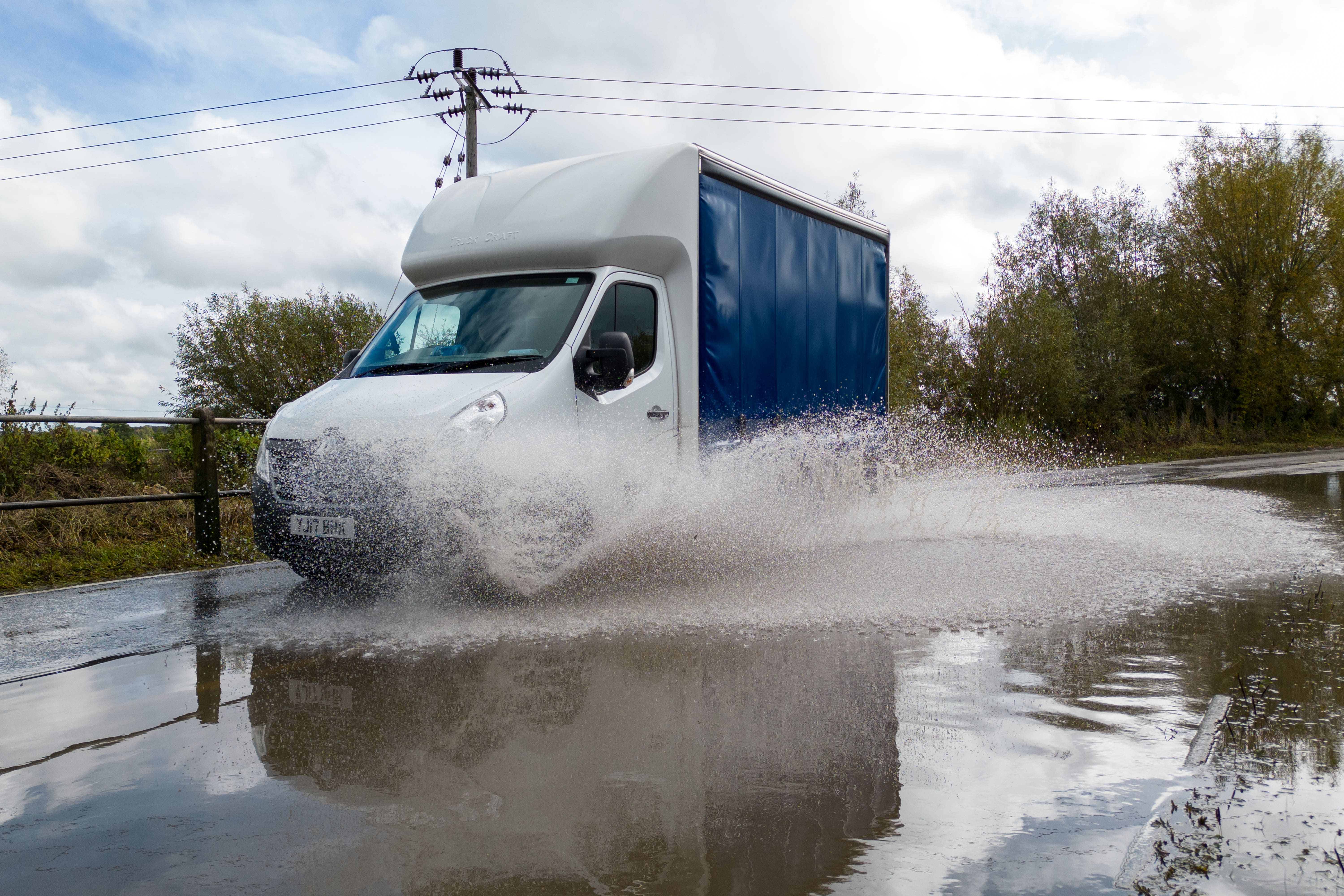 A van on a partially flooded road near Mountsorrel in Leicestershire, after thundery showers on Monday brought big downpours in places, with surface water on the roads and lightning and hail. Picture date: Tuesday October 8, 2024.