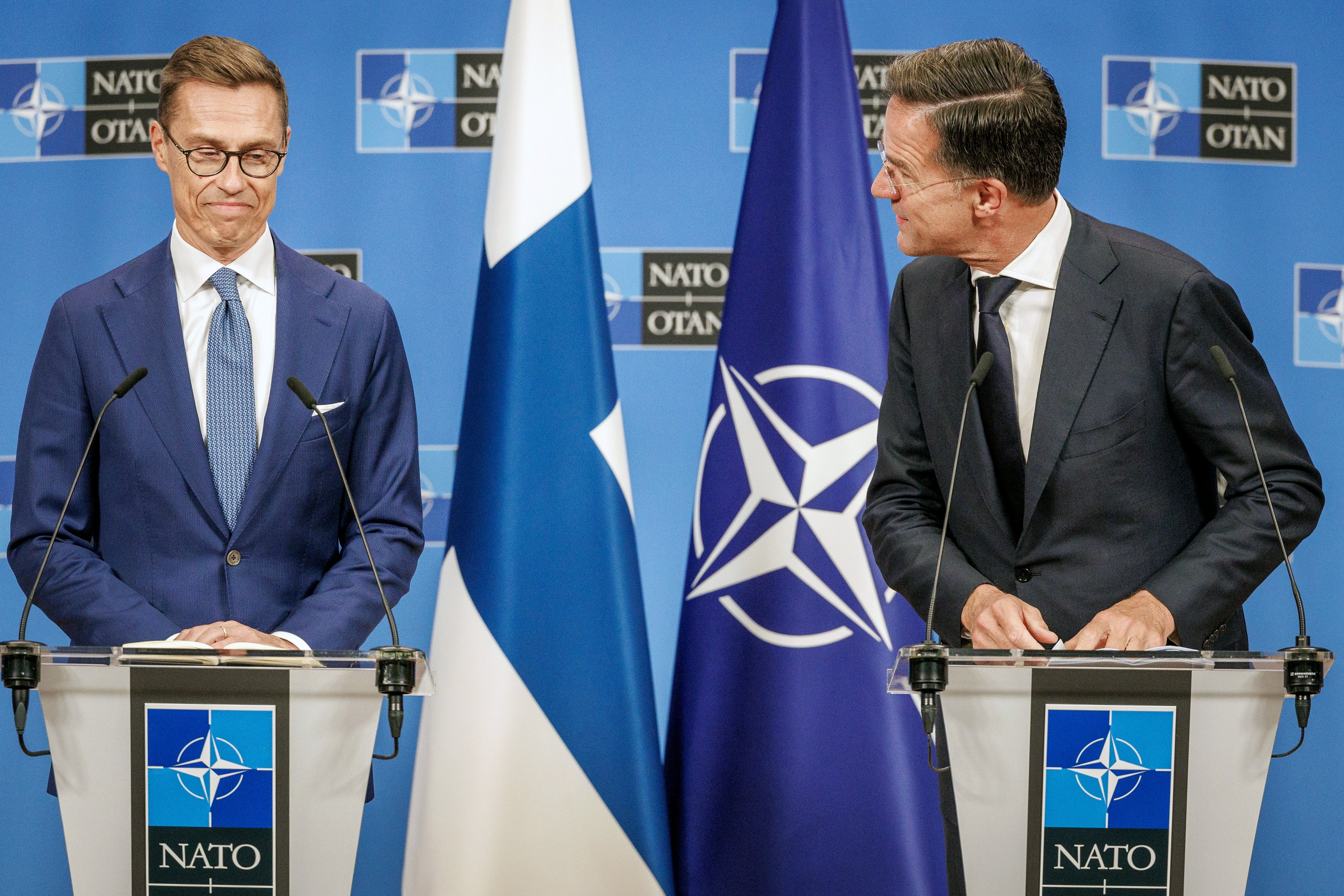 President of Finland Alexander Stubb, left, and NATO secretary general Mark Rutte, right