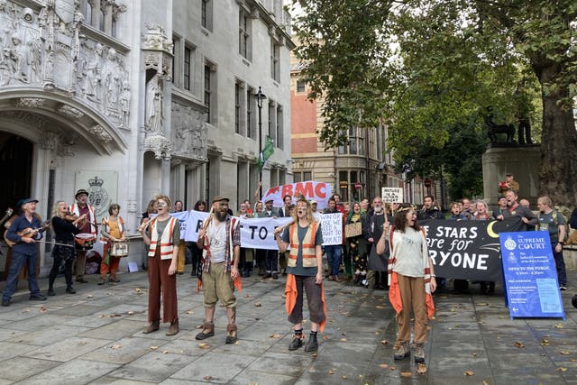 Campaigners outside the Supreme Court in London (PA)