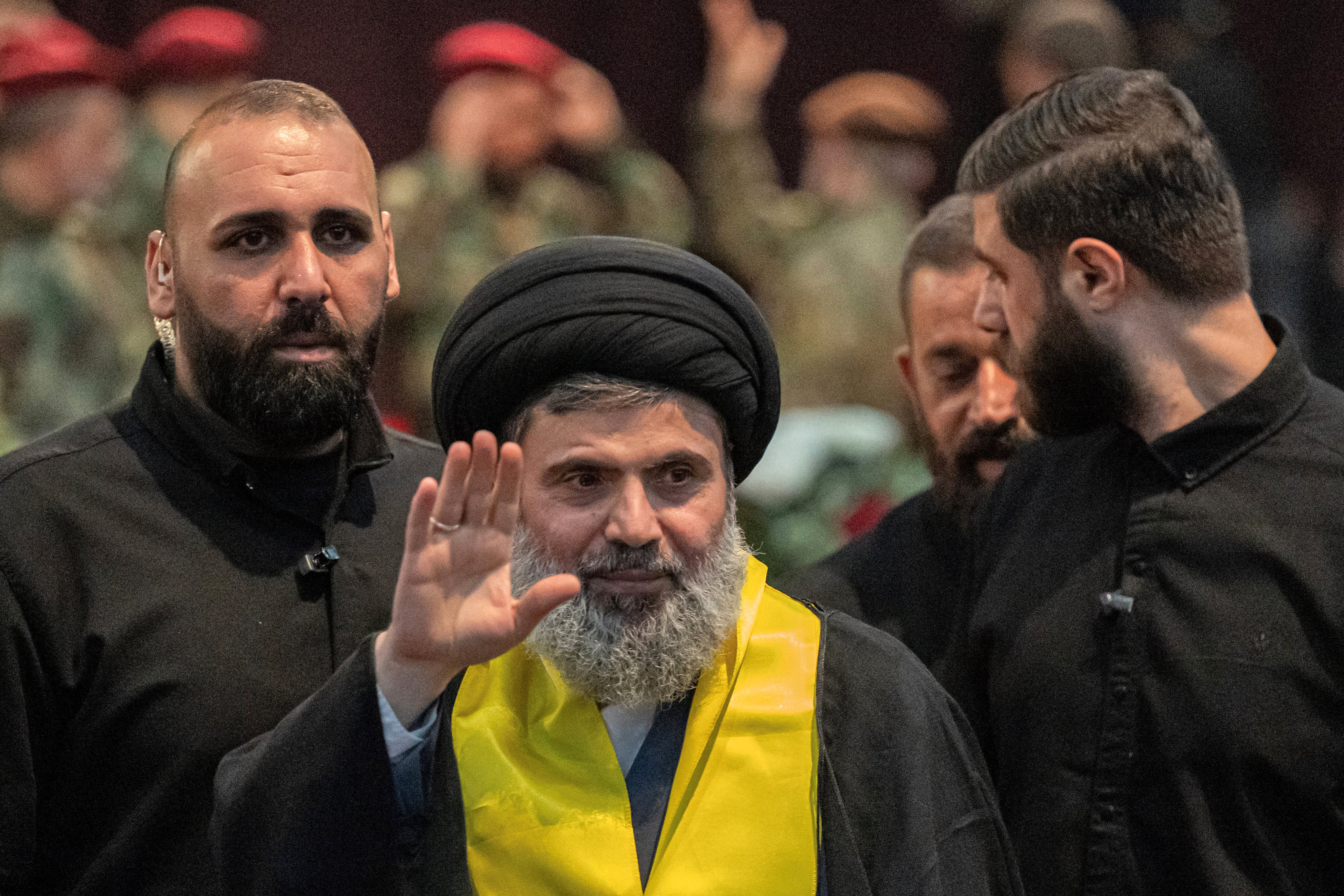 Files: Senior Hezbollah official Hashem Safieddine (C) attends the funeral ceremony of slain top commander Fuad Shukr in Beirut's southern suburbs on 1 August 2024