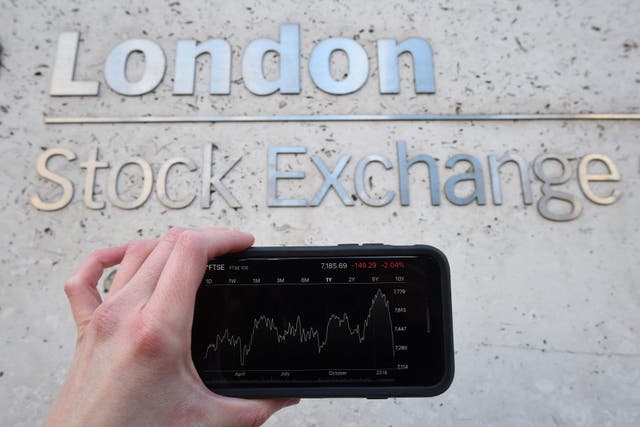 The UK’s FTSE 100 tumbled to a nearly one-month low on Tuesday (Kirsty O’Connor/PA)