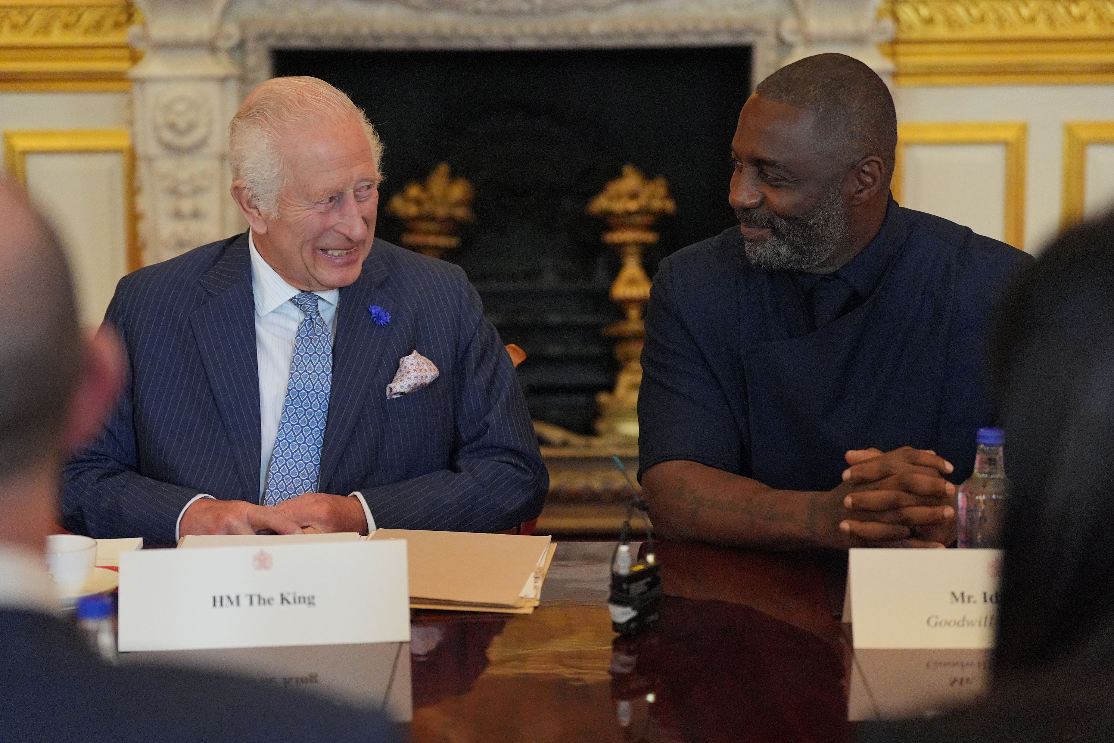 The King and Idris Elba attending an event for The King’s Trust to discuss youth opportunity (Yui Mok/PA)