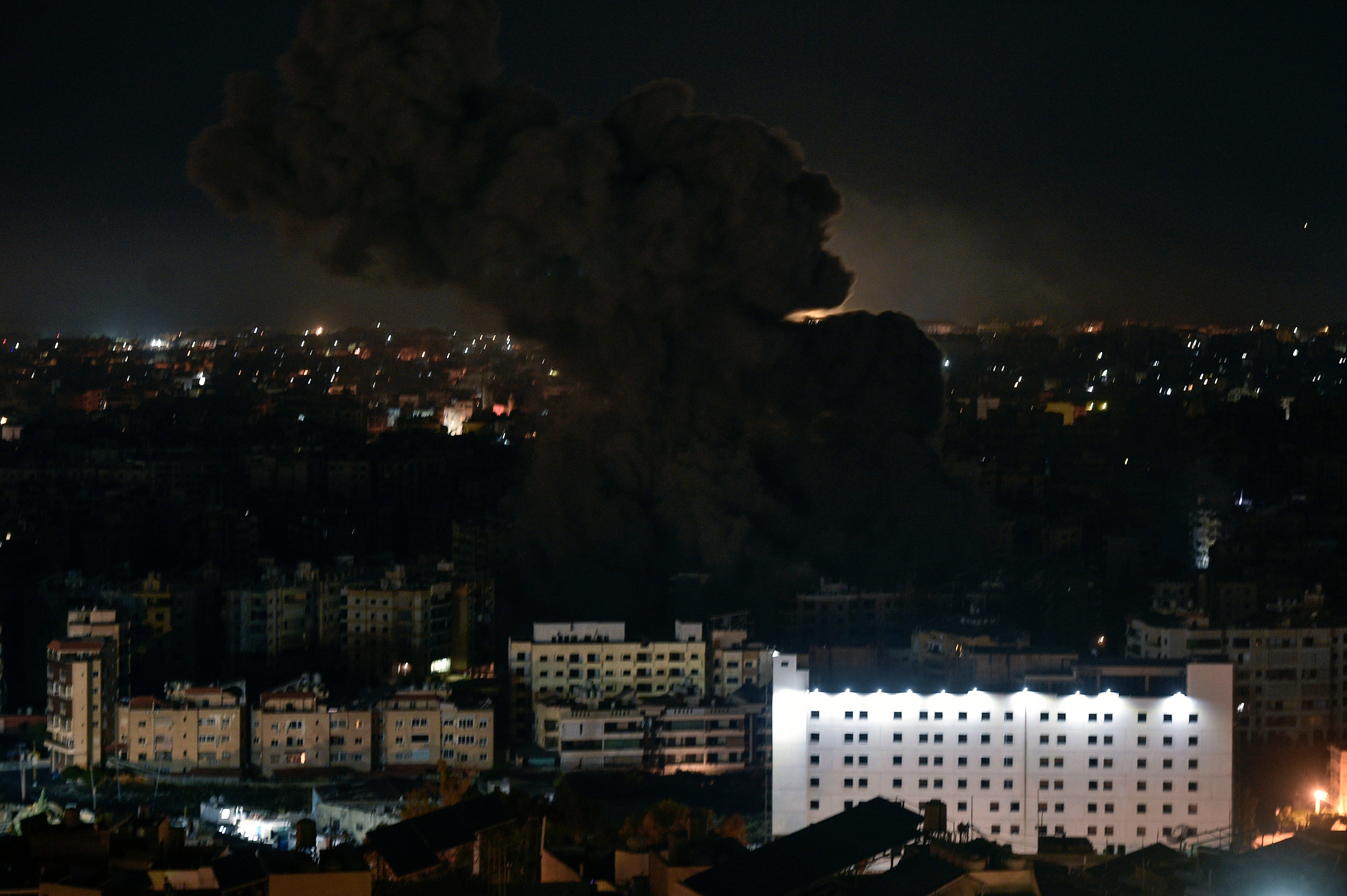 Smoke rises over Rafik Hariri International Airport after Israeli airstrike at Dahieh