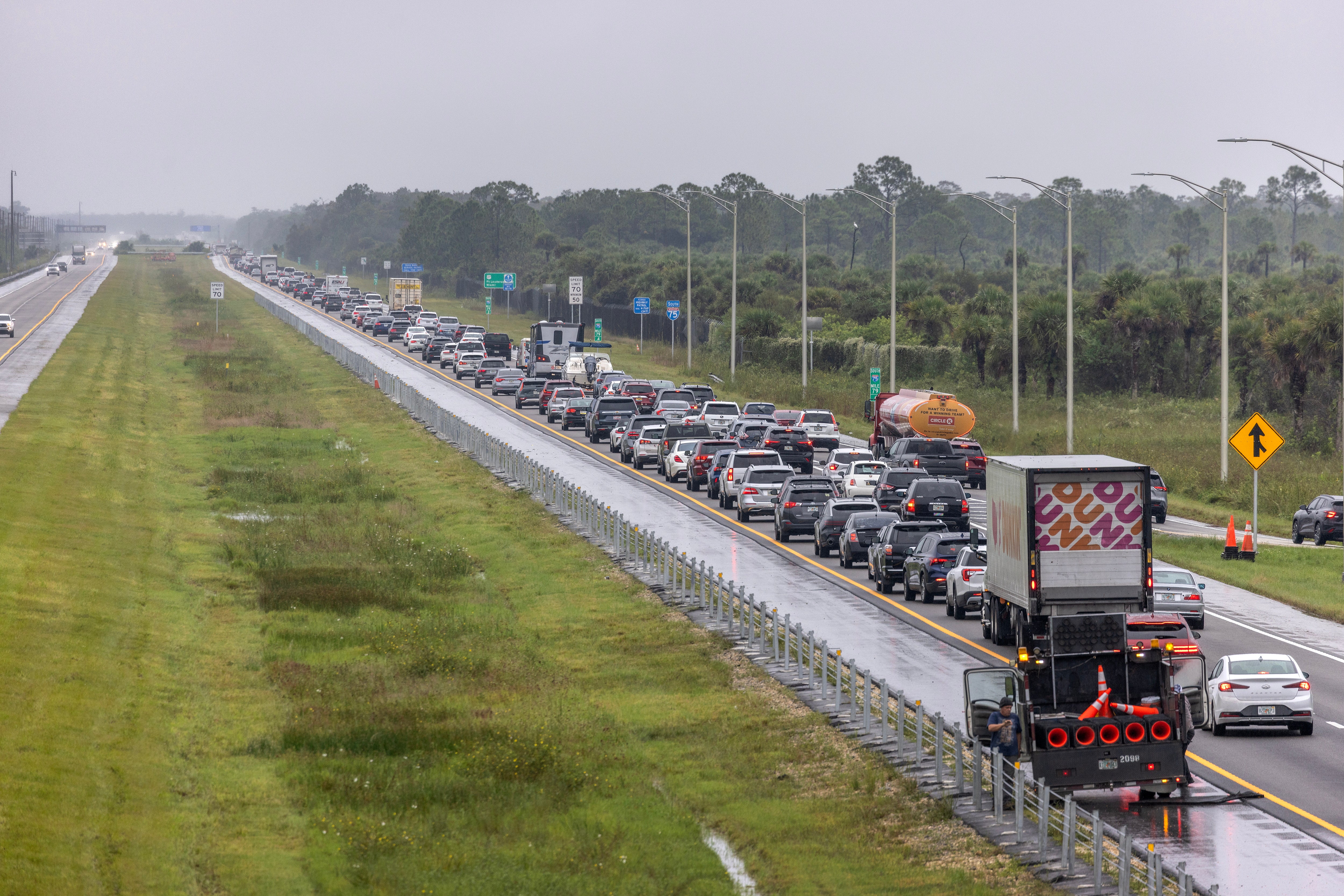 Ahead of the expected arrival of Hurricane Milton, a large flow of evacuation traffic moves slowly south from northwest Florida on Interstate 75, in Naples, Florida, United States, on 8 October 2024.