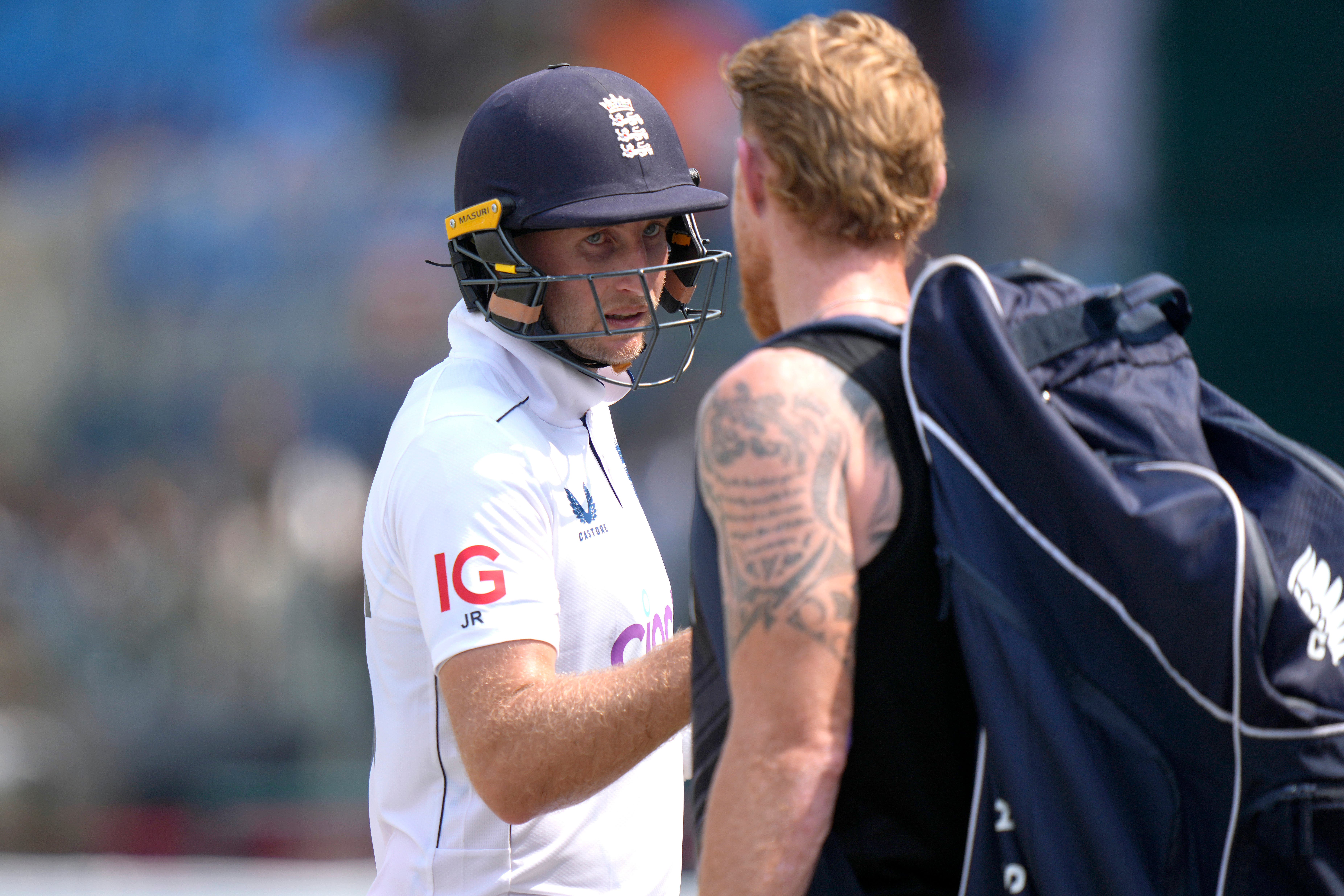 Joe Root, left, is congratulated by Ben Stokes (Anjum Naveed/AP)