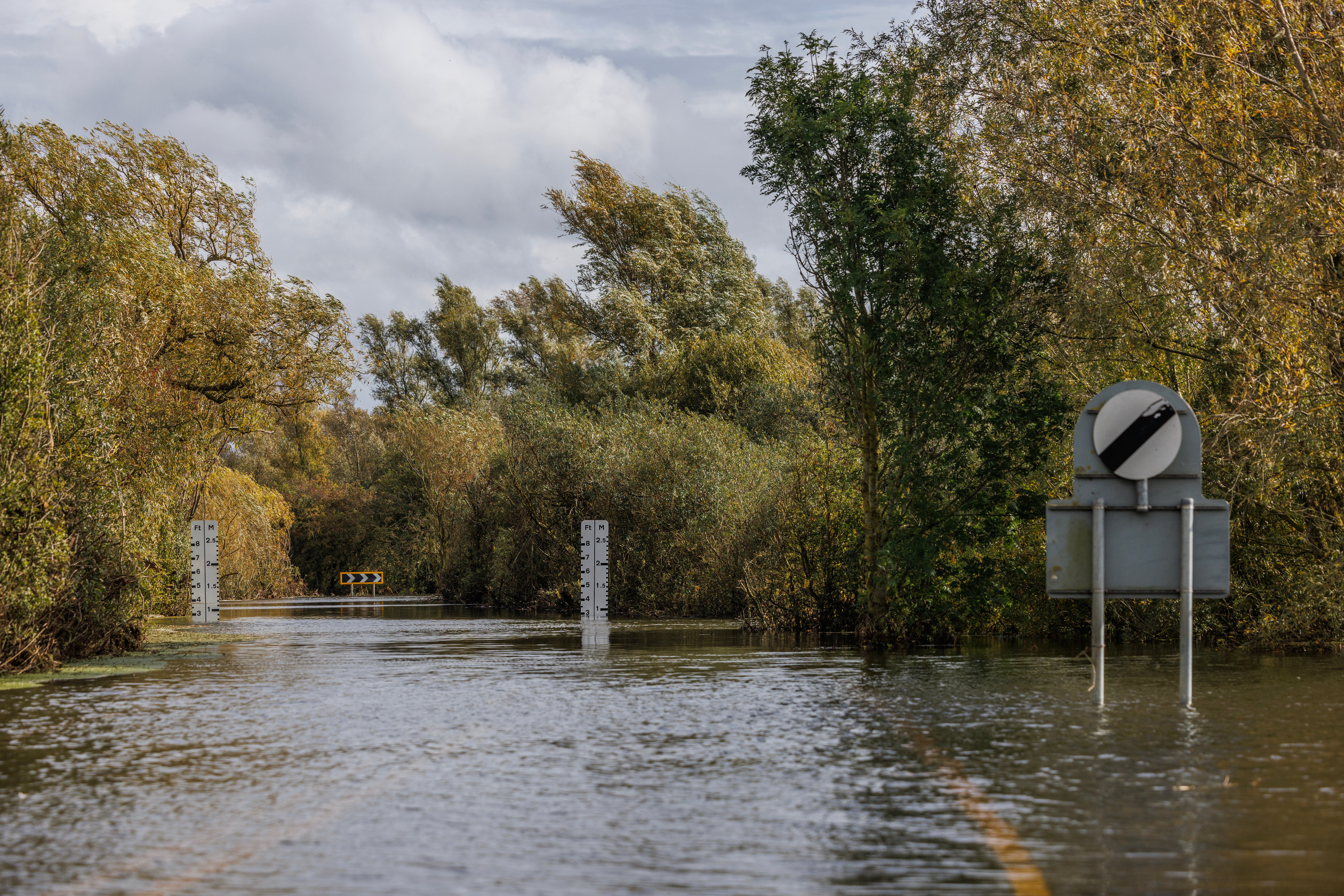 Drivers faced a 22 mile detour after the Old Bedford River and the River Delph burst their banks after recent heavy rain