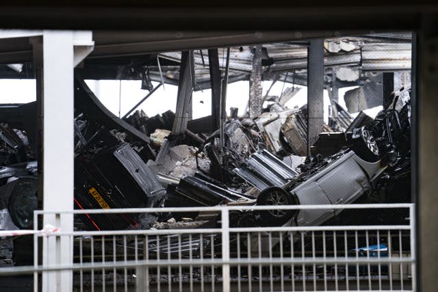 The fire at Luton Airport started in a red Range Rover, a report said (Jordan Pettitt/PA)