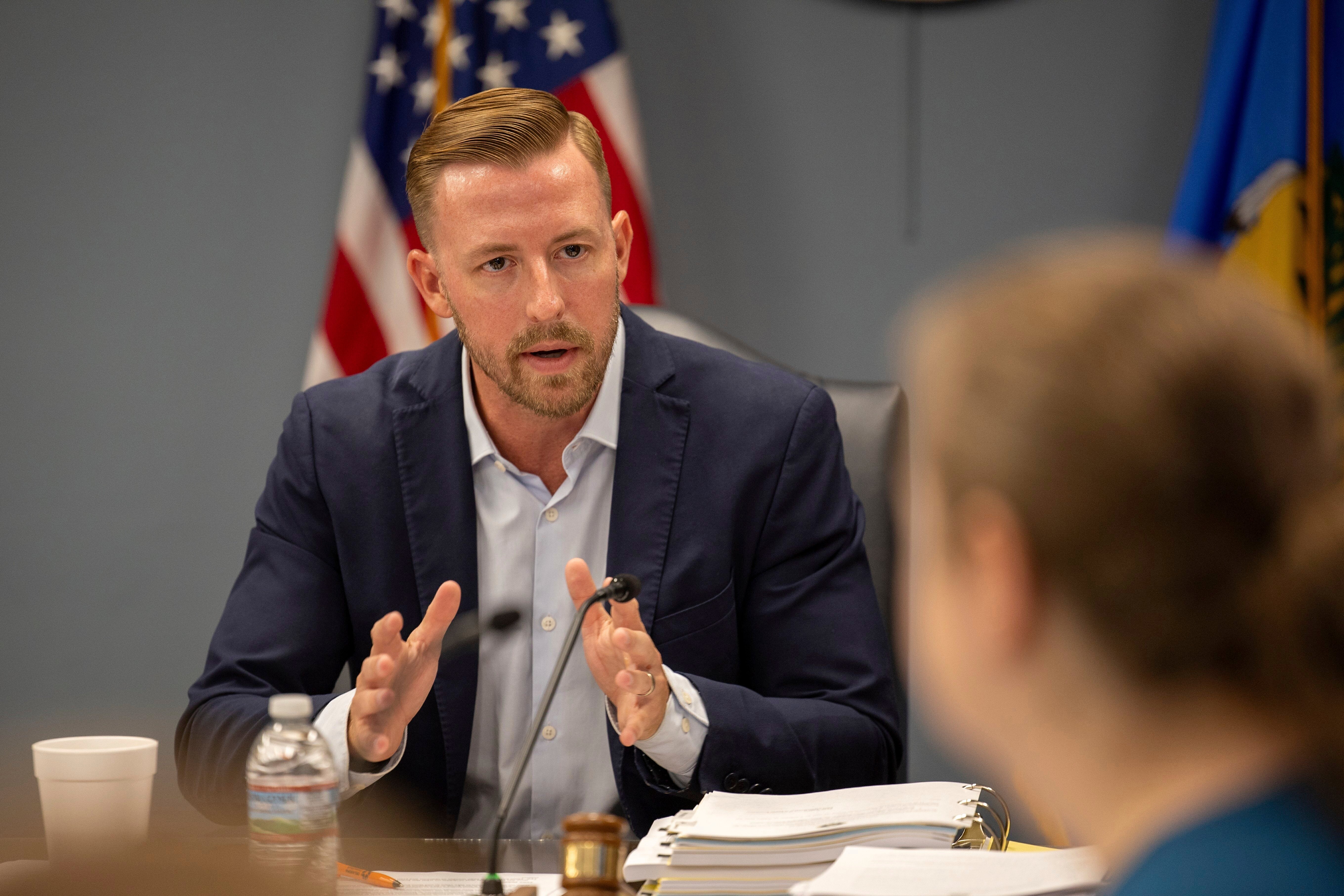 State Superintendent Ryan Walters speaks to members of the State Board of Education during a meeting in Oklahoma City, Oklahoma. He has pushed for Bibles to be used in classrooms