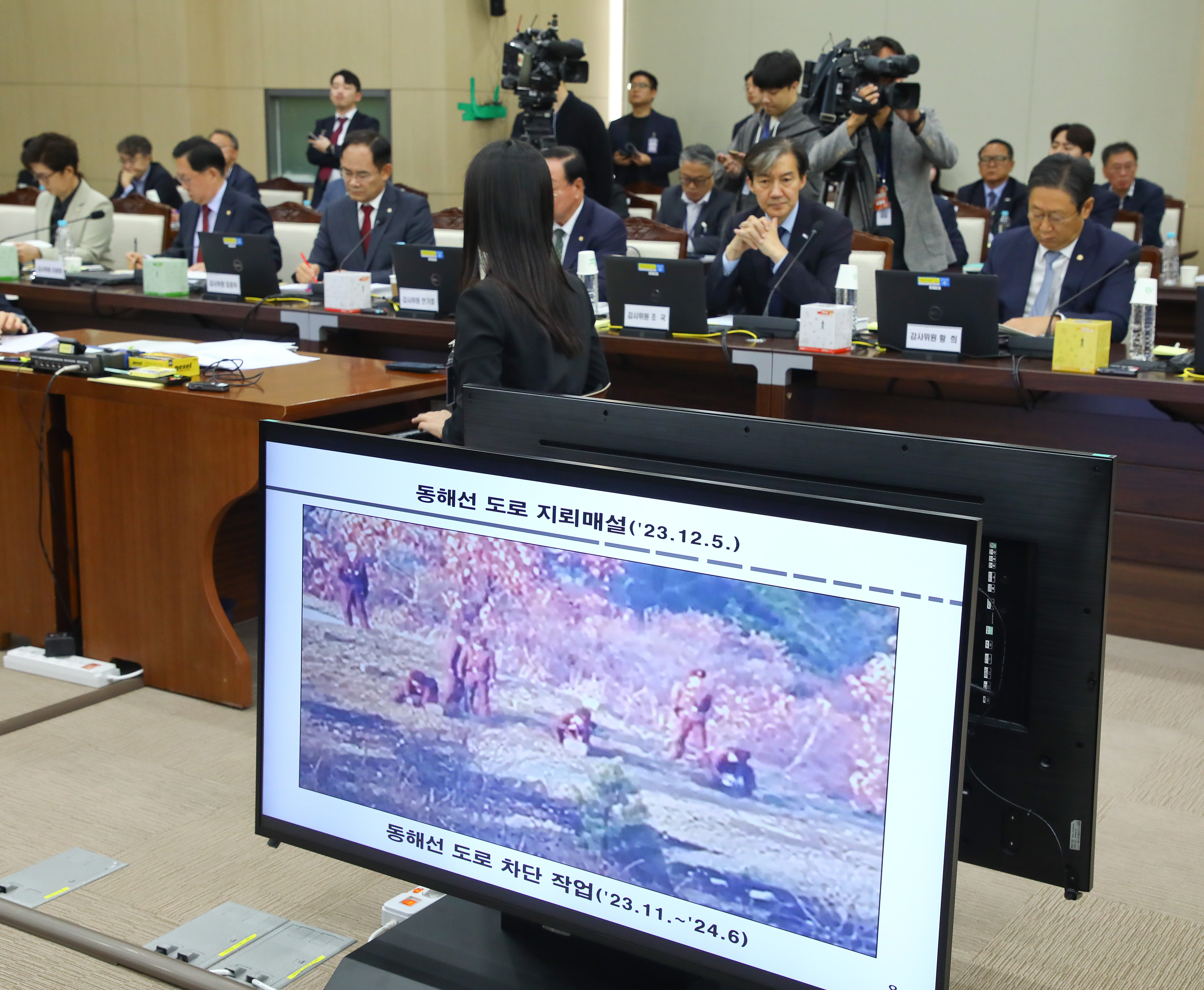Photo shows North Korean soldiers working to block a road to the South along the east coast