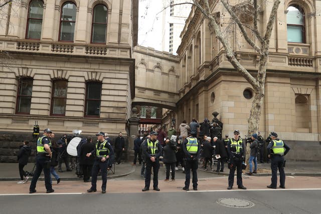 <p>File. Media and police are seen outside the Supreme Court of Victoria </p>