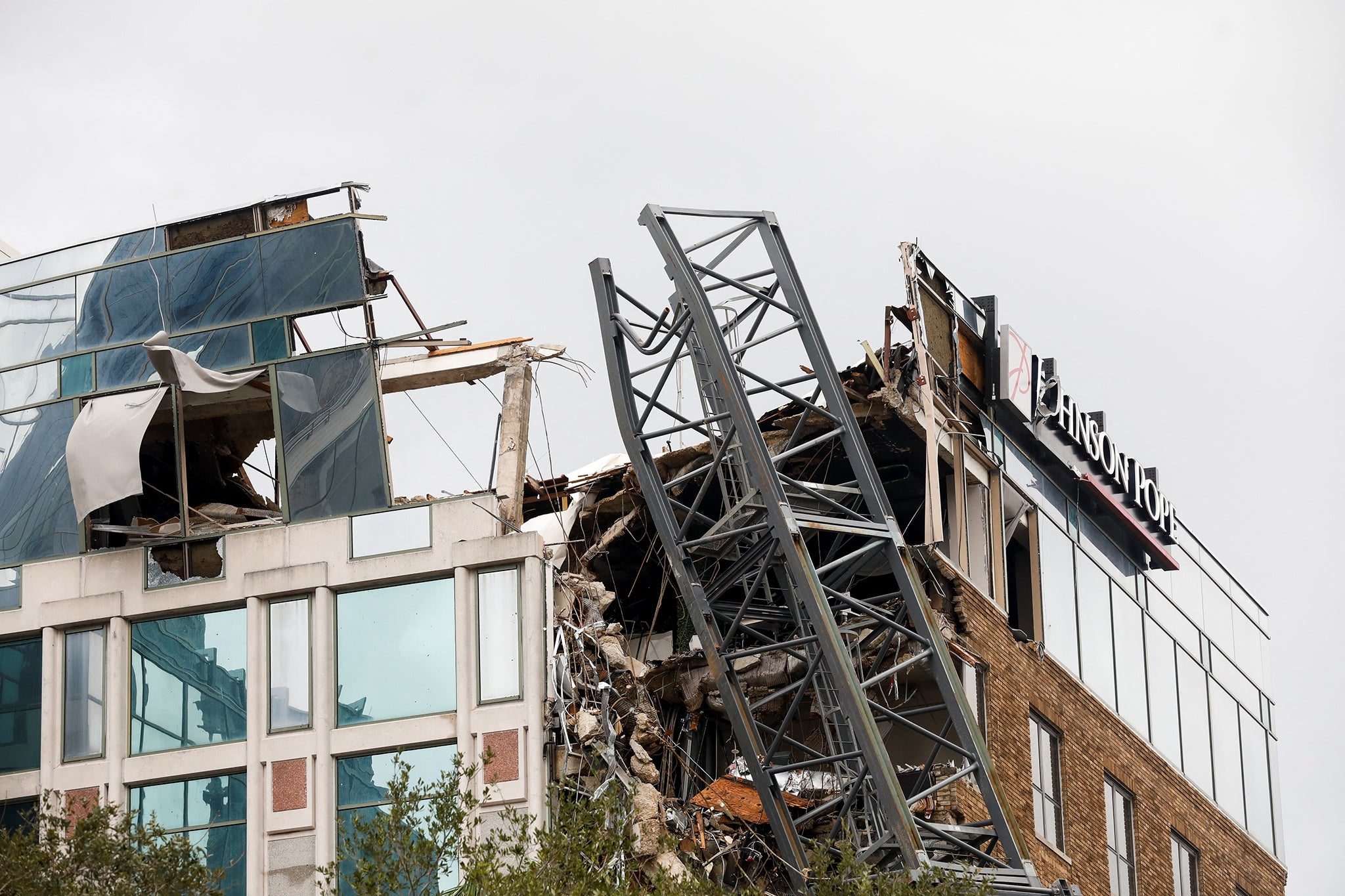 A view shows a collapsed construction crane that fell on the building that also hosts the offices of the Tampa Bay Times