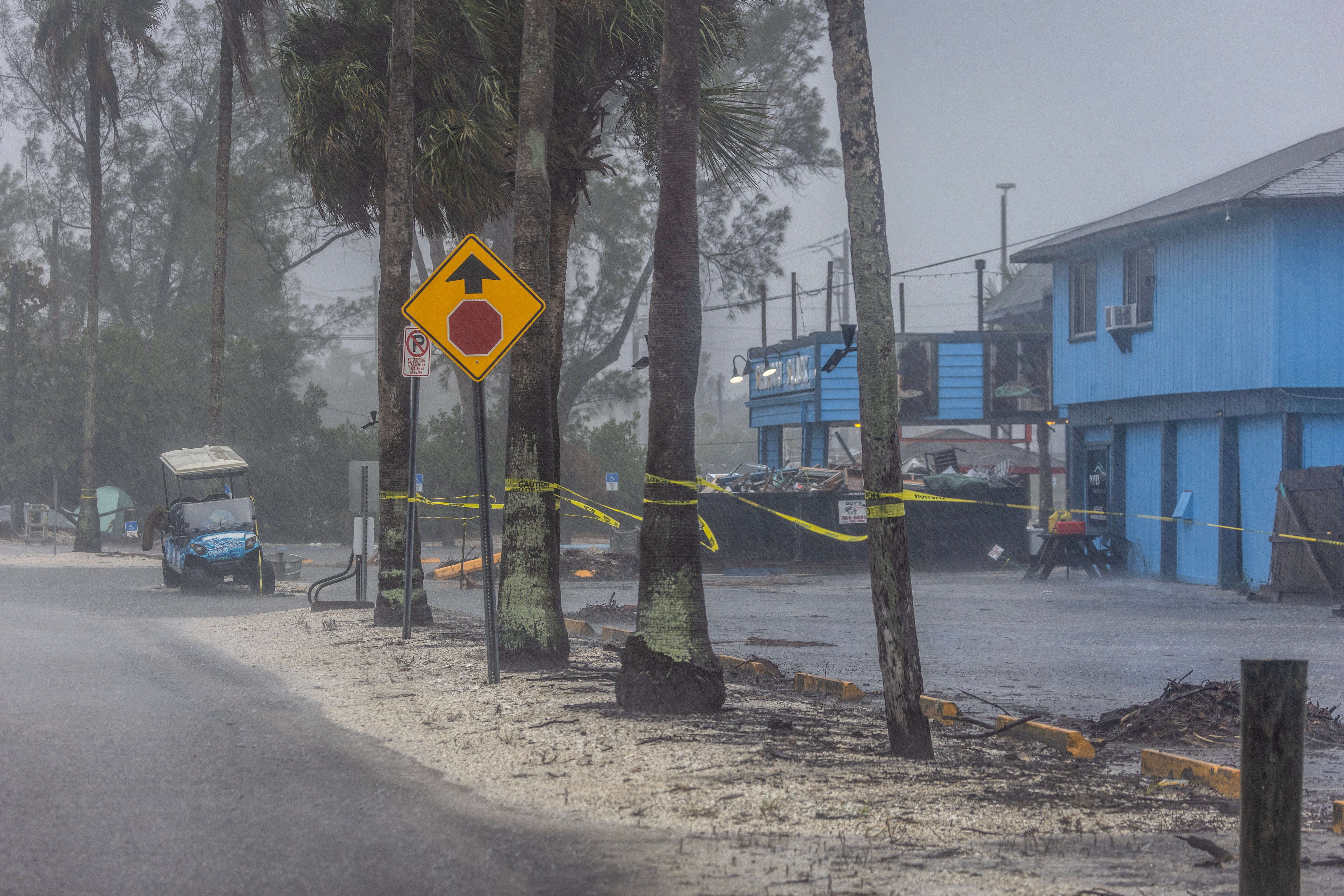Authorities in Sarasota, Florida, close the Oyster Bay marina as the city prepares for landfall. Milton landed in Sarasota around 8.30 p.m. as a Category 3 storm. The strong winds and heavy rains impacted Florida’s Gulf Coast for hours before the landfall. The storm knocked down trees and ripped off roofs