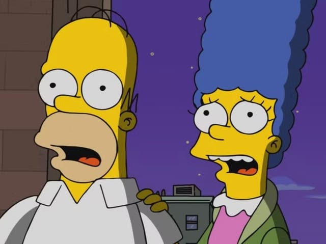 <p>Homer and Marge Simpson in ‘The Simpsons’</p>