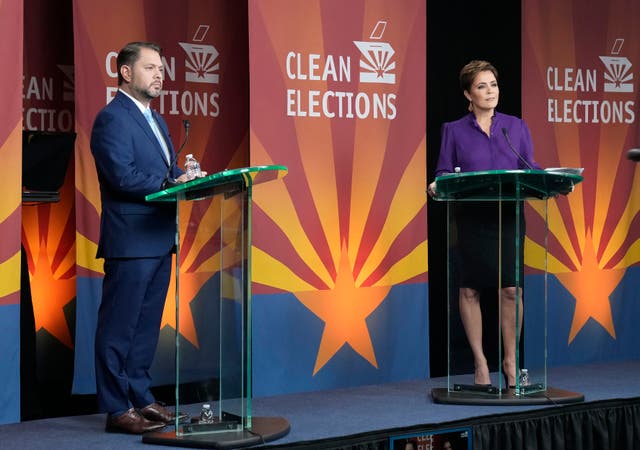 <p>U.S. Senate candidates Rep. Ruben Gallego, D-Ariz., left, and Republican challenger Kari Lake participate in their debate on Oct. 9 in Phoenix </p>