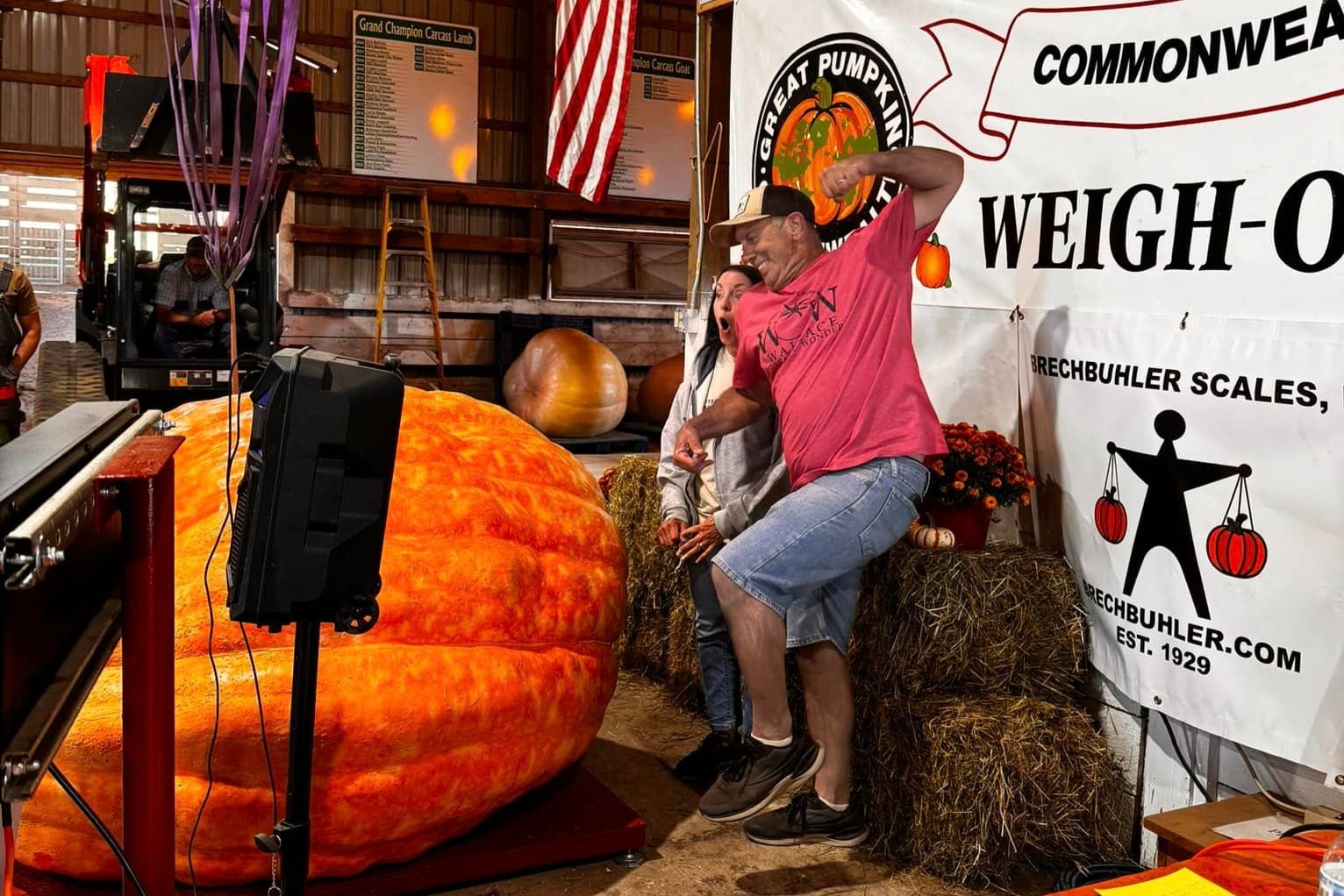 Dave and Carol Stelts celebrate breaking the Pennsylvania state record for heaviest pumpkin