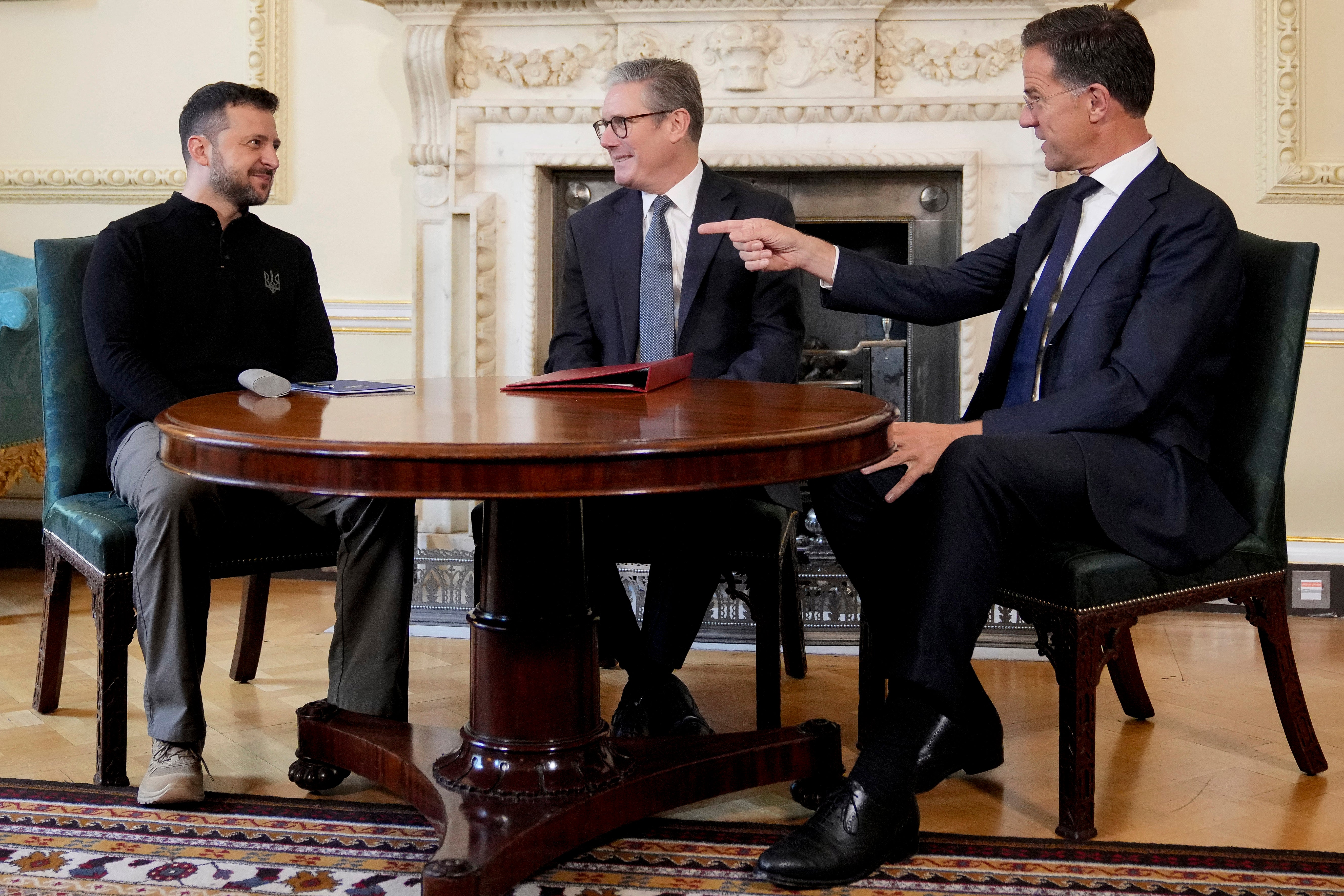 British prime minister Keir Starmer, Volodymyr Zelensky and Nato secretary general Mark Rutte speak during a trilateral meeting inside 10 Downing Street