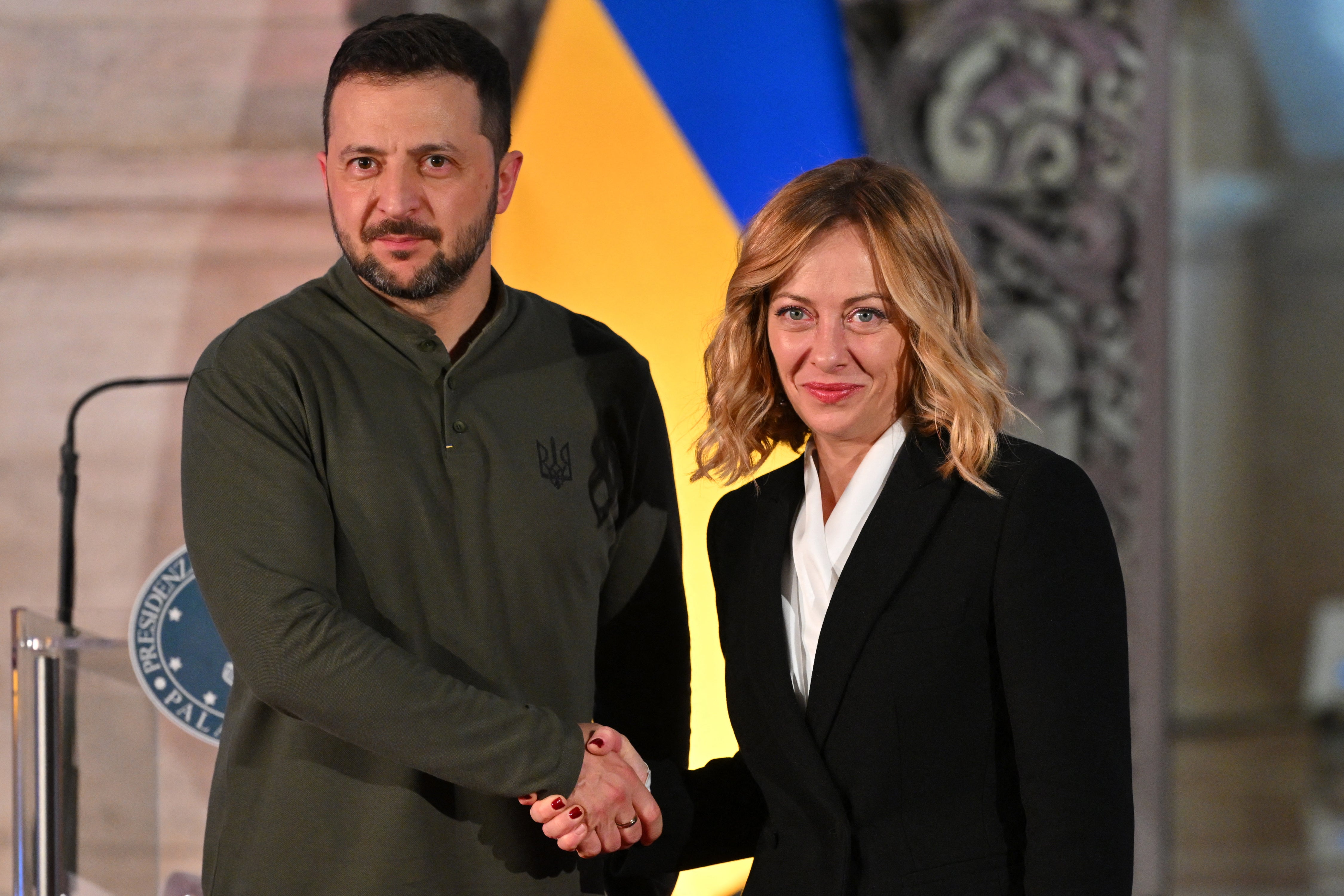 Italian PM Giorgia Meloni and Volodymyr Zelensky shake hands after their meeting at Villa Doria Pamphilj in Rome