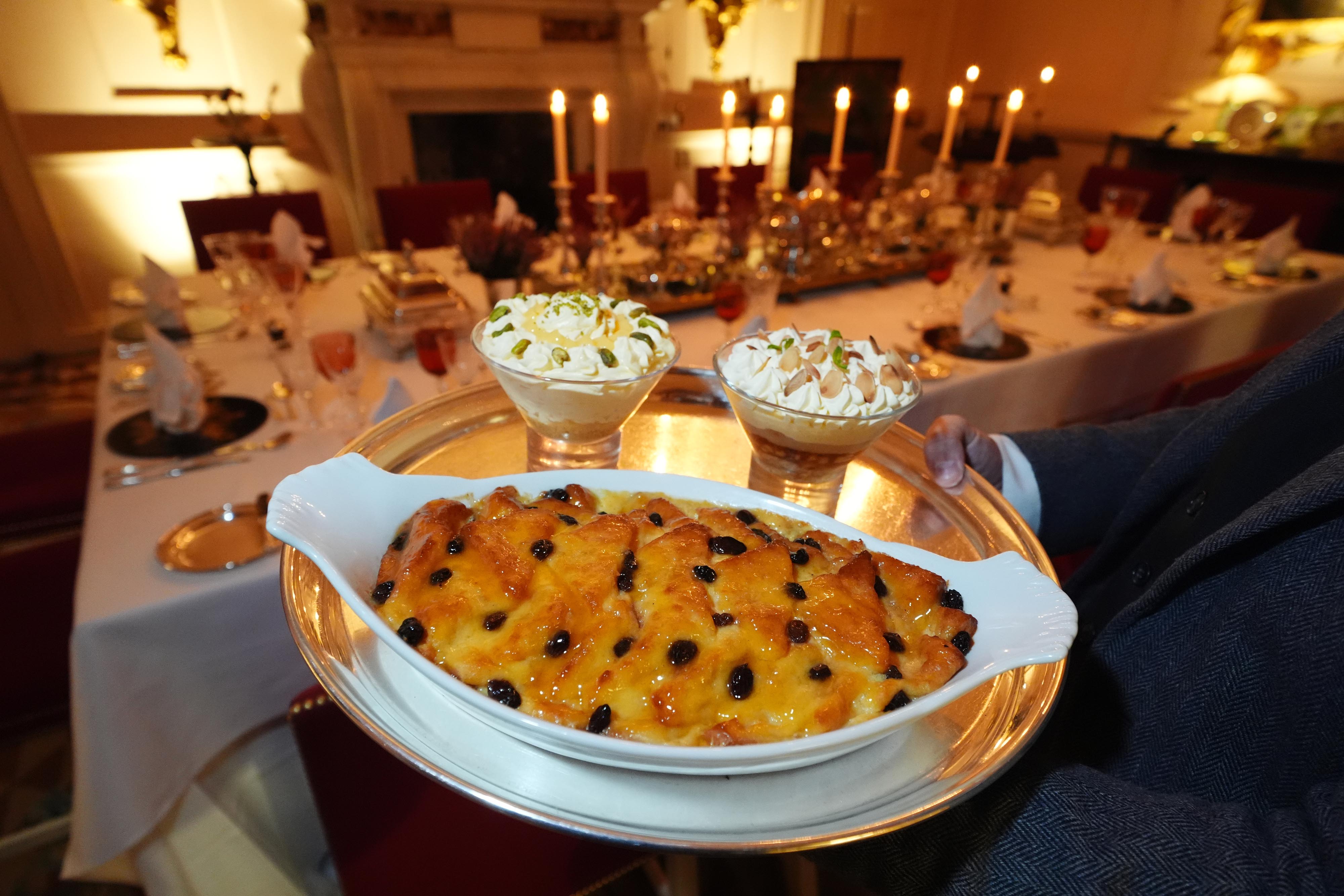 A lemon and pistachio syllabub, bread and butter pudding and an apple and almond trifle (Andrew Milligan/PA)