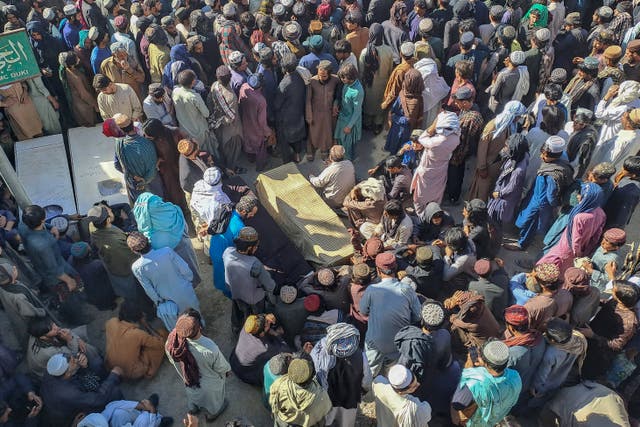 <p>Miners and labourers at a funeral for victims of the terror attack in Duki district of Balochistan province, Pakistan </p>