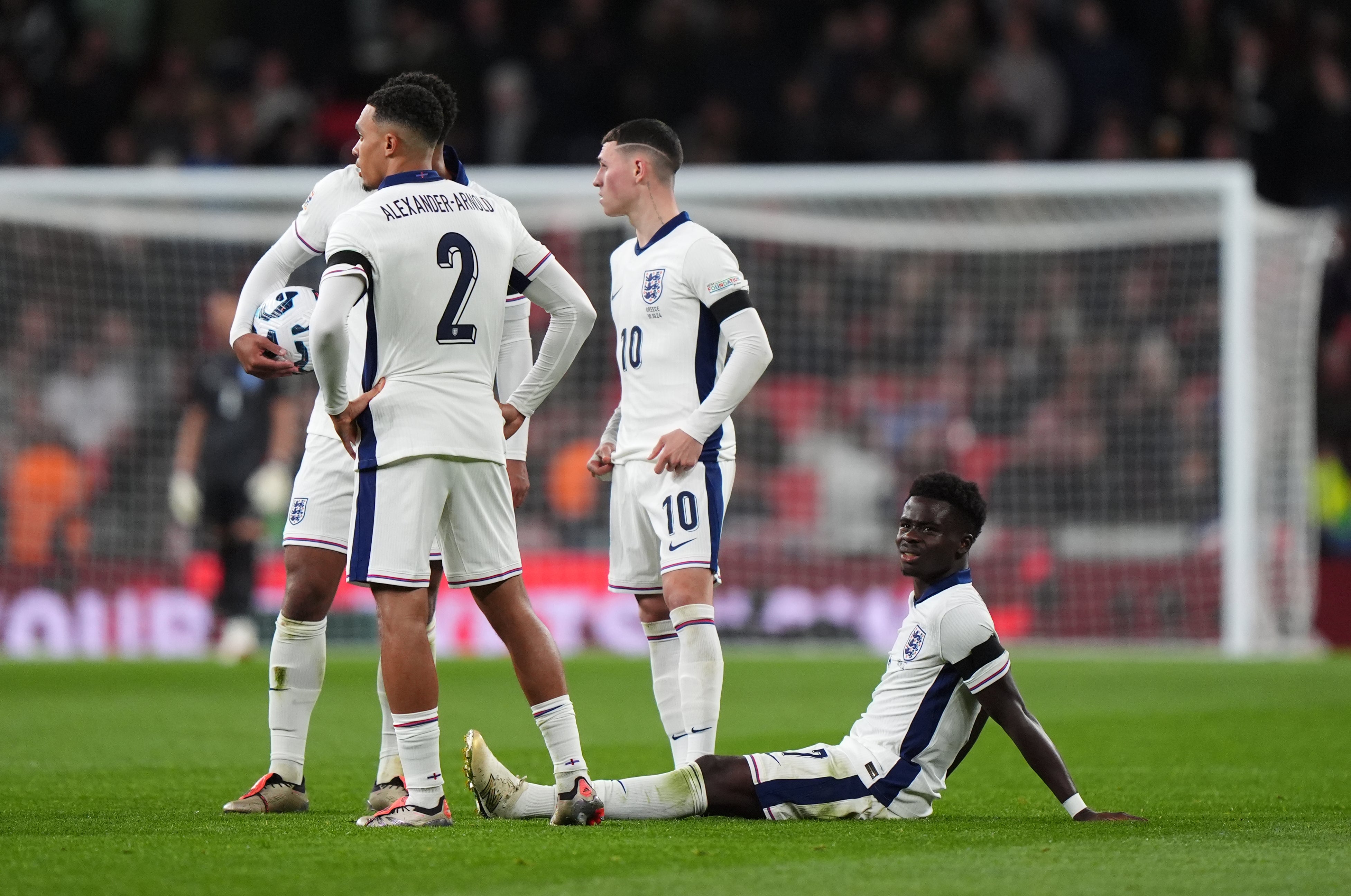 Bukayo Saka, right, suffered an injury against Greece