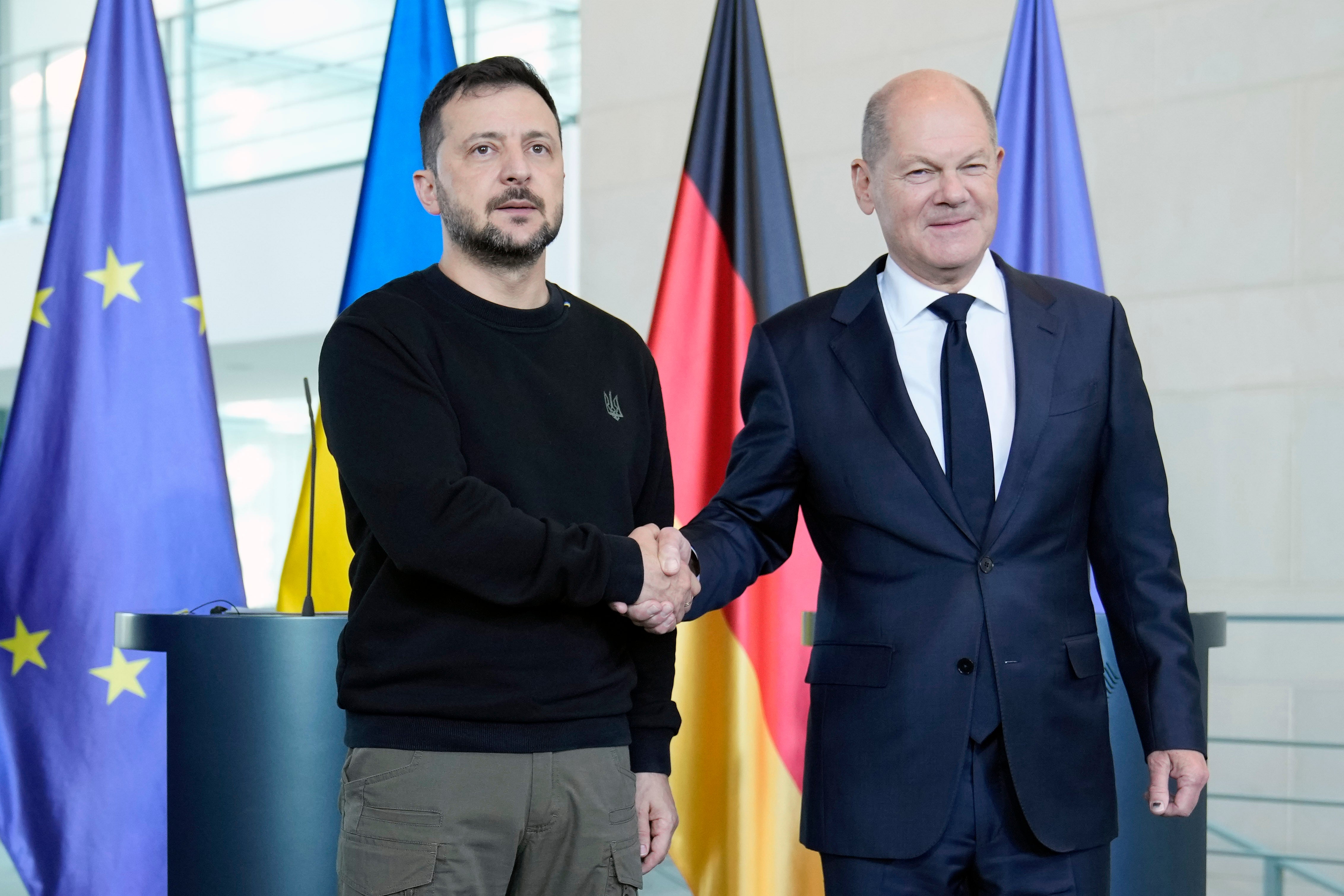 Ukraine’s president Volodymyr Zelensky and German chancellor Olaf Scholz shake hands at the chancellery in Berlin, Germany