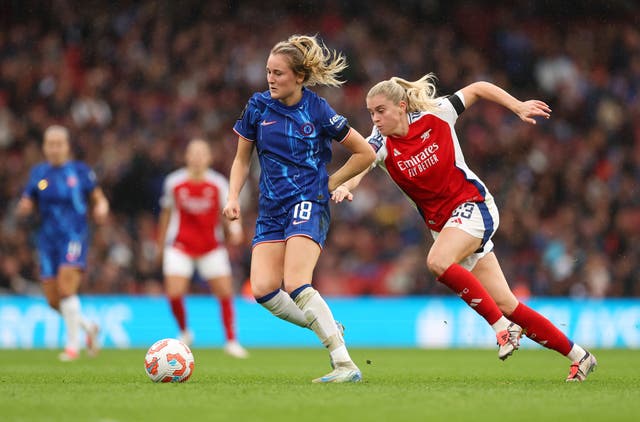 <p>Wieke Kaptein of Chelsea is challenged by Alessia Russo of Arsenal</p>