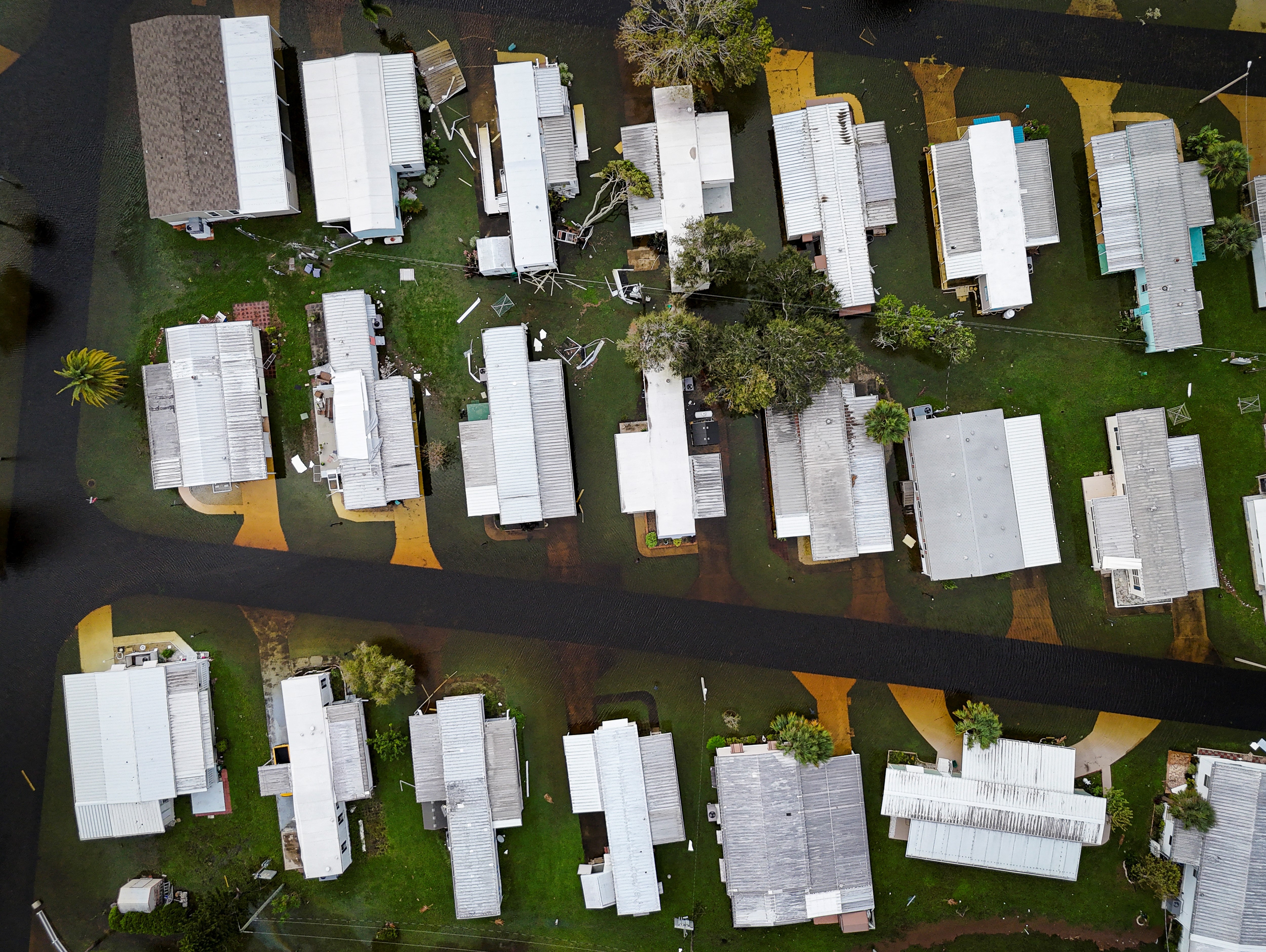 An aerial view shows a flooded neighborhood in the aftermath of Hurricane Milton in South Daytona, Florida, on October 11