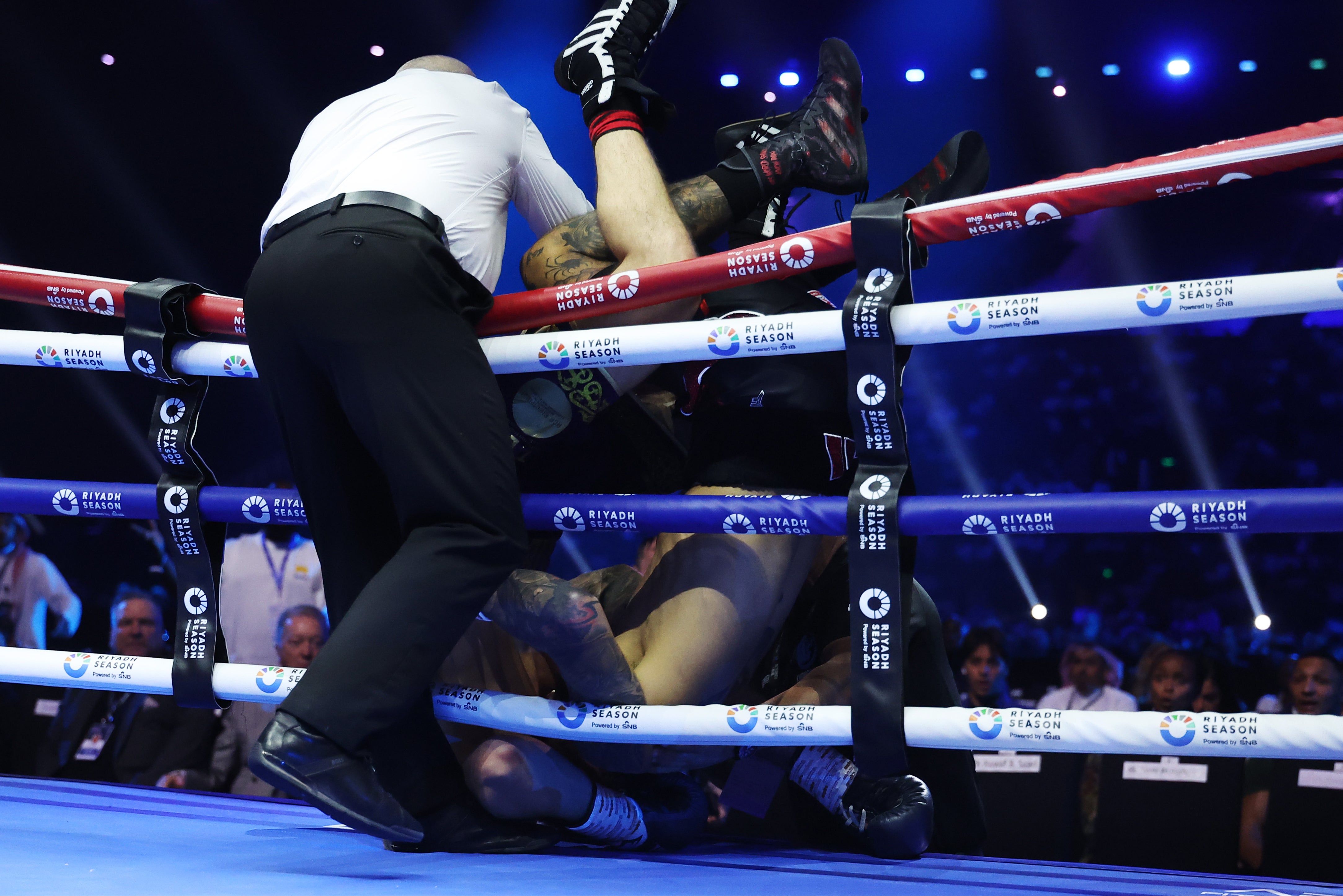 Ben Whittaker and Liam Cameron fall over the top rope