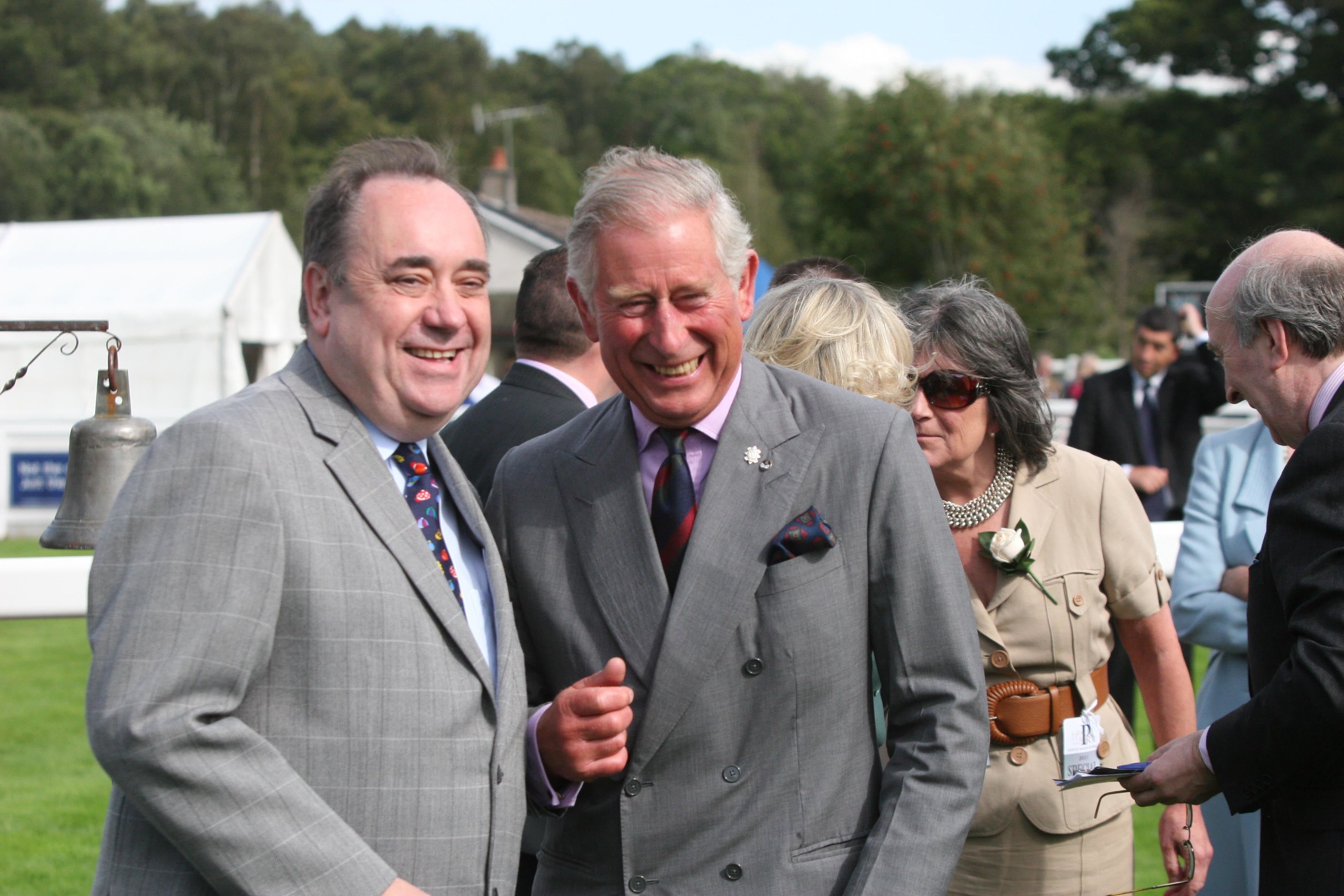 The then-Prince of Wales with Alex Salmond, who served as first minister of Scotland from 2007 to 2014, at a charity race day at Perth Racecourse