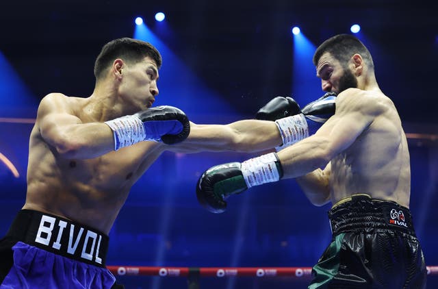 <p>Dmitry Bivol (left) and Artur Beterbiev in their undisputed title fight in October</p>