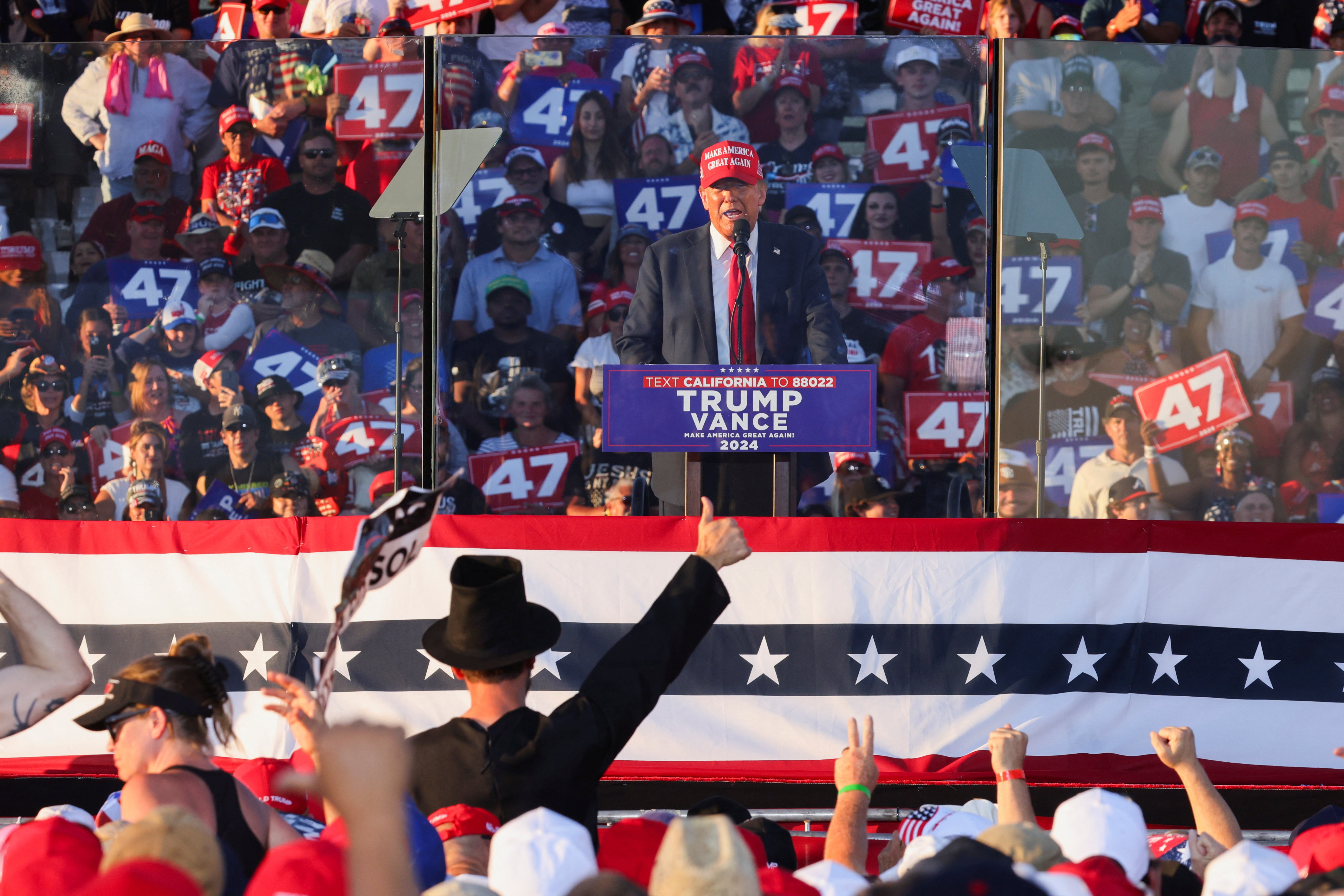 A supporter dressed as former U.S. President Abraham Lincoln gestures as Republican presidential nominee and former U.S. President Donald Trump