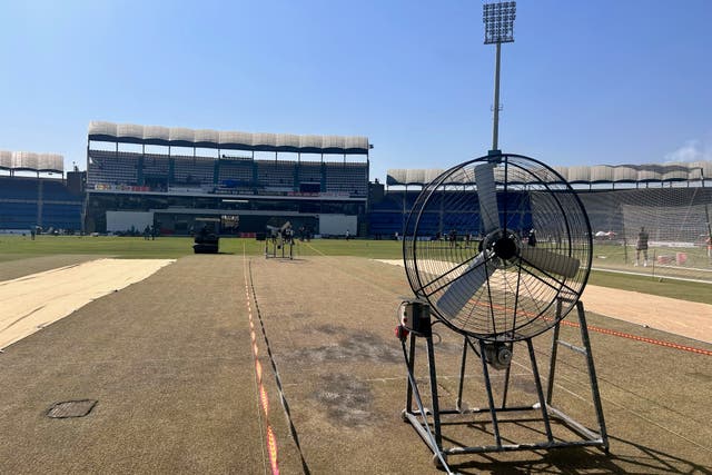 <p>Grounds-staff are drying out the Multan pitch for re-use </p>