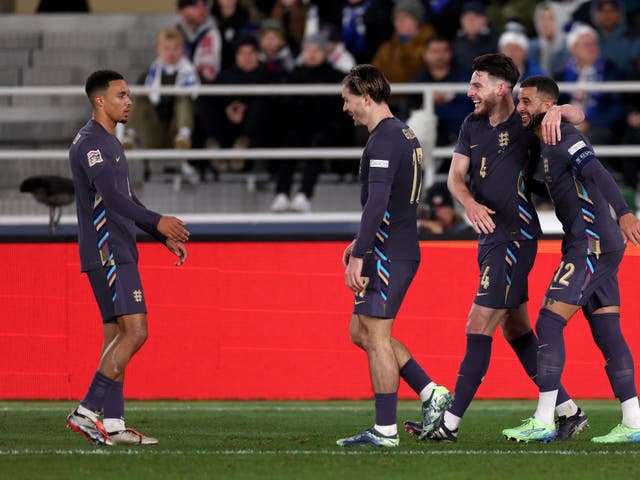 <p>Grealish jokes with Alexander-Arnold after his free-kick </p>