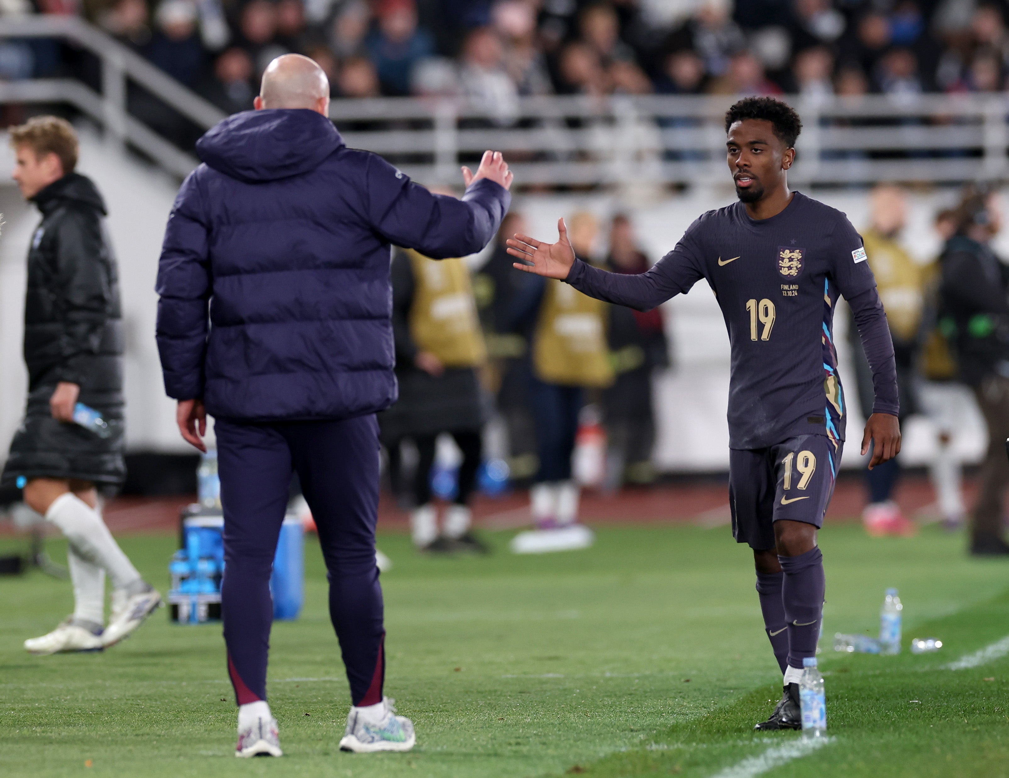 Lee Carsley with Angel Gomes, who set up Jack Grealish for England’s first goal against Finland