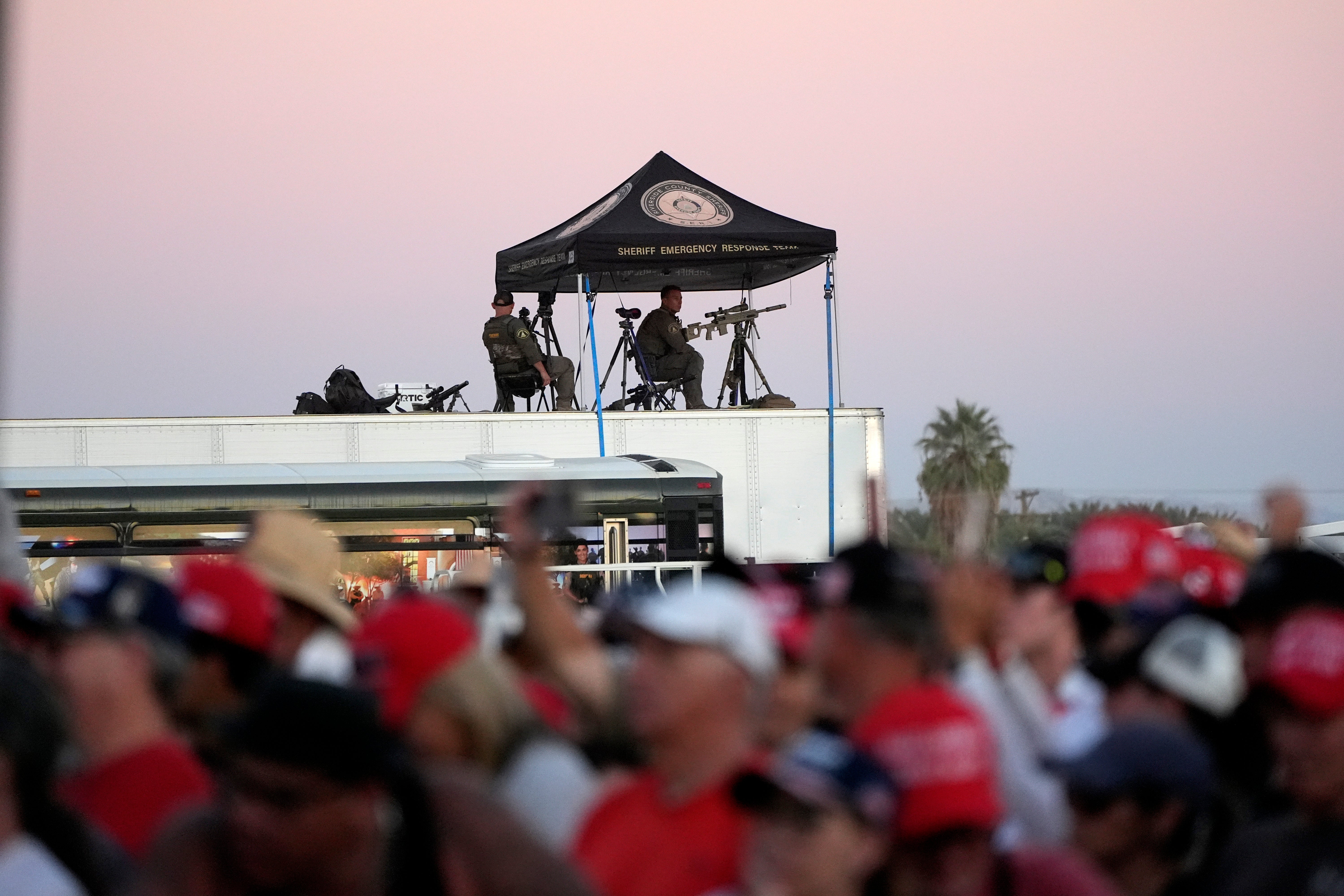 Law enforcement snipers look over the scene as Trump speaks at Calhoun Ranch rally