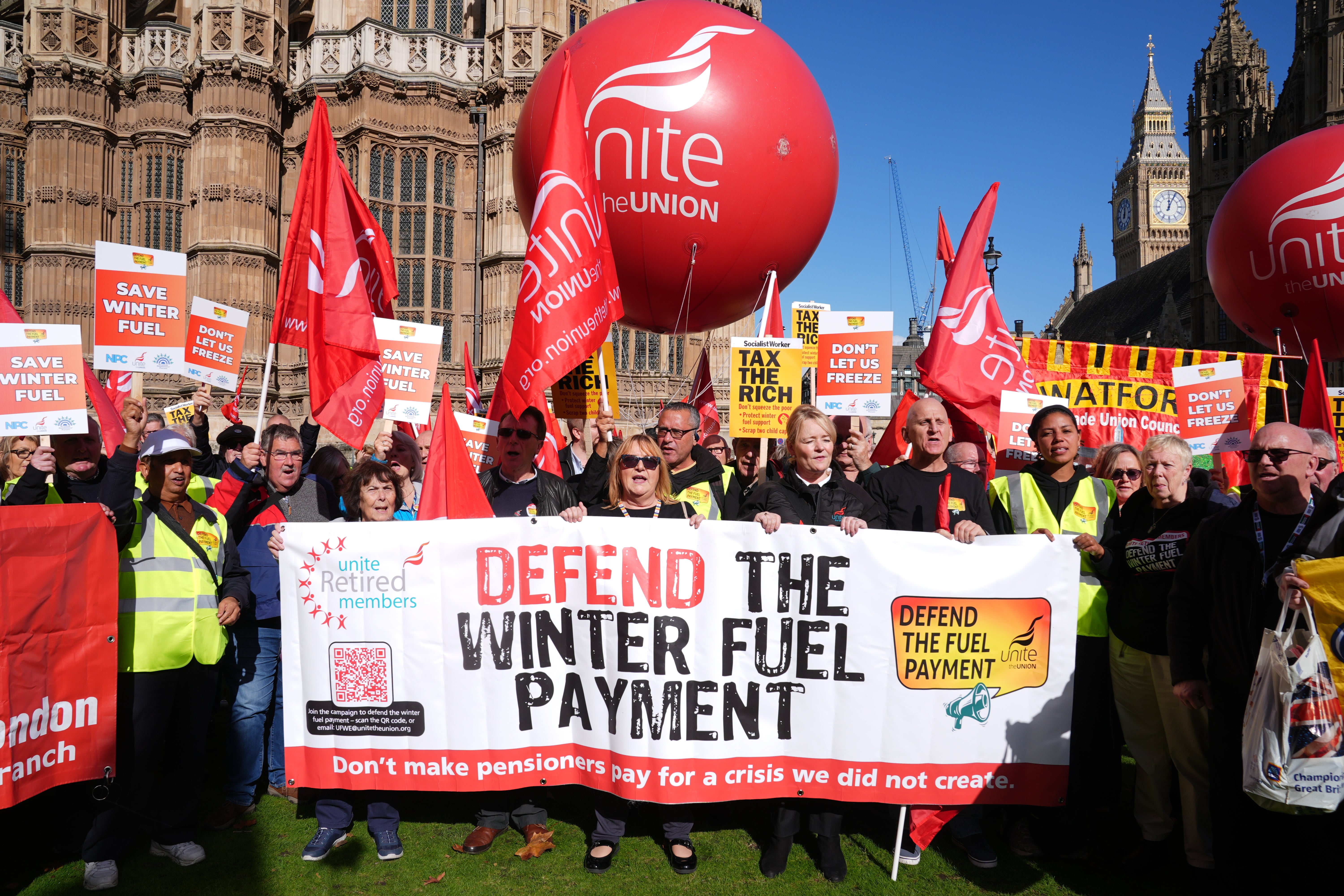 Campaigners protest outside parliament following the government’s decision to scrap the winter fuel allowance for a large cohort of pensioners