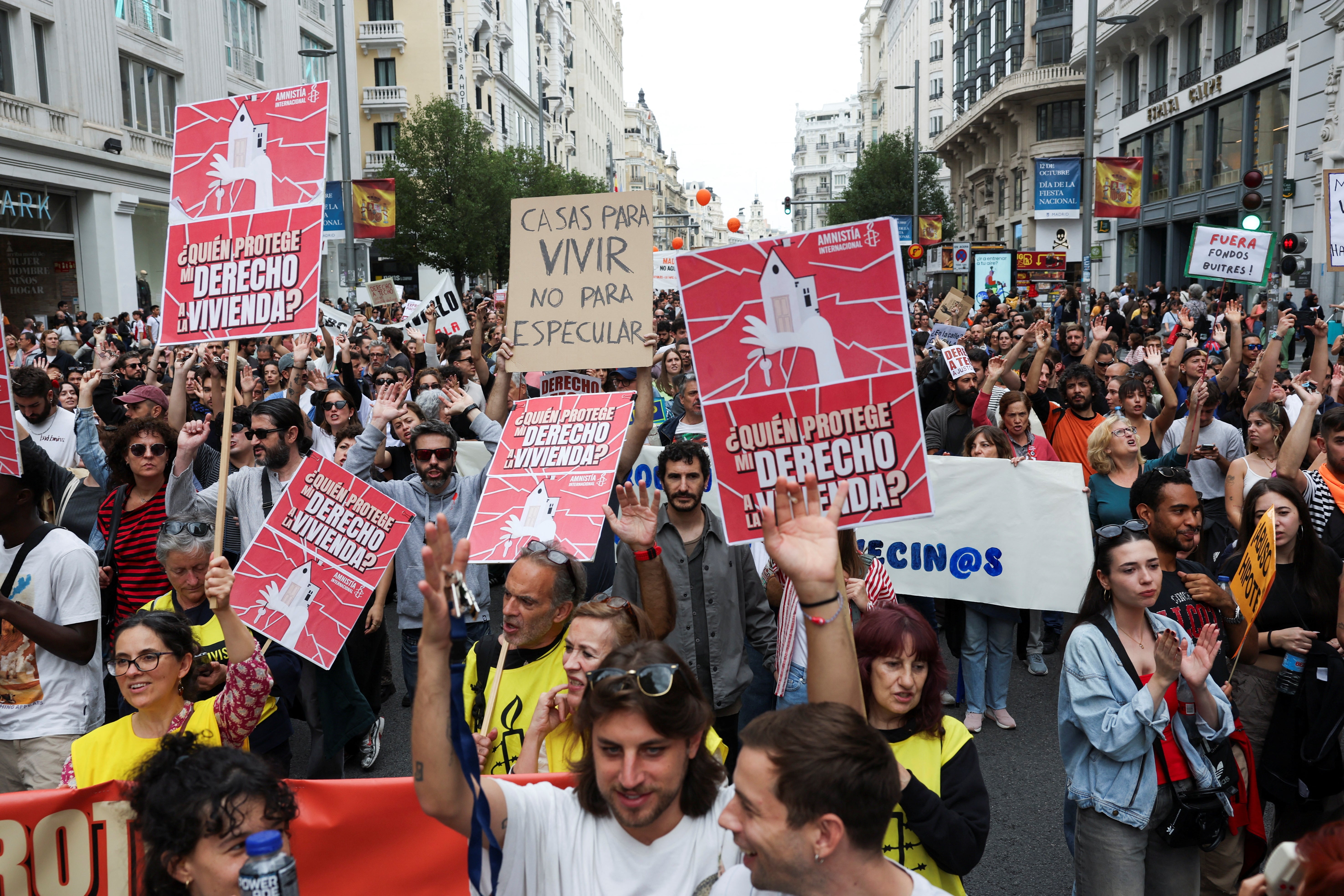 People protest as they demand lower housing rental prices and better living conditions in Madrid, Spain, October 13,