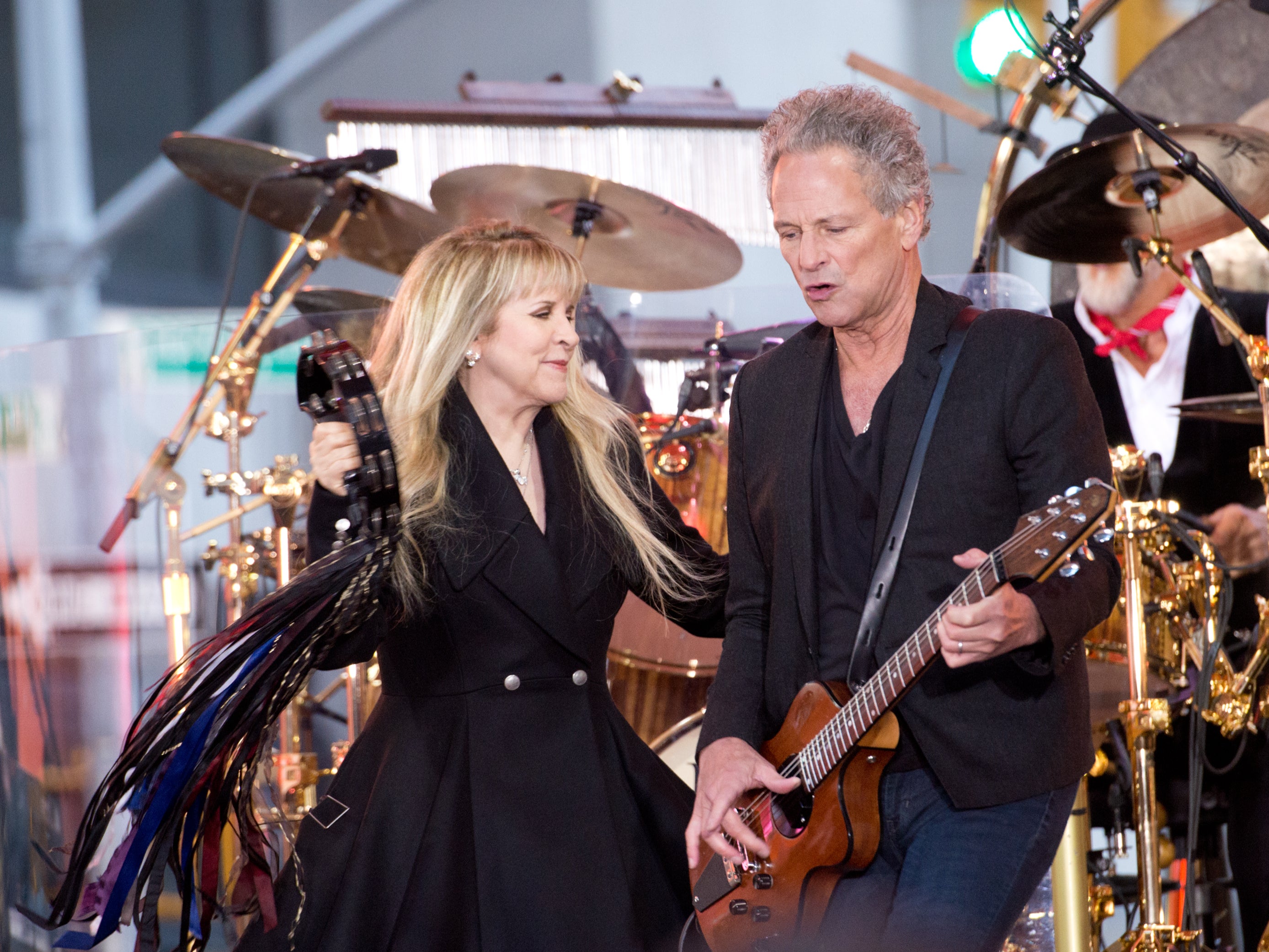 Stevie Nicks and Lindsey Buckingham performing together with Fleetwood Mac in 2014